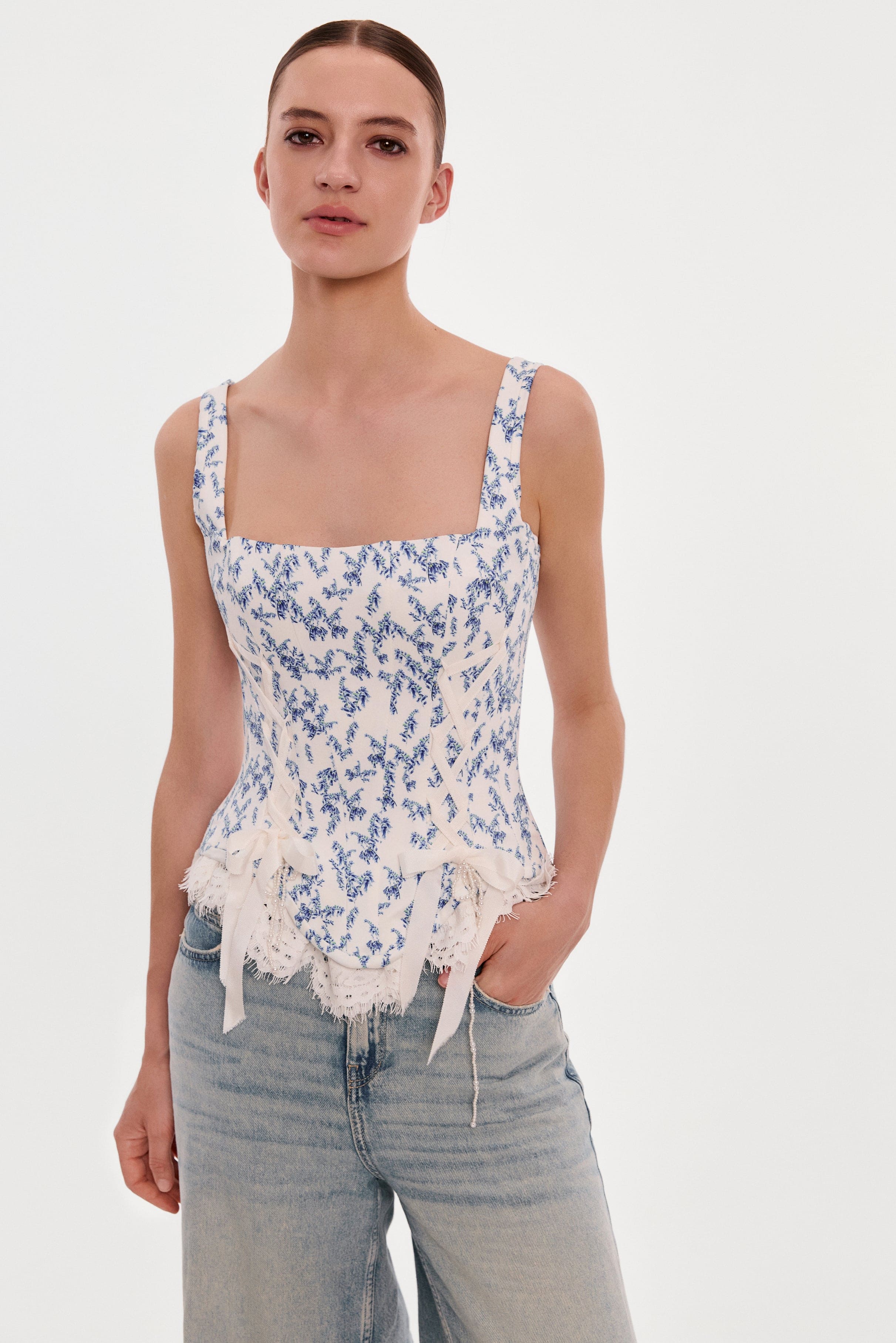 Blue lavender corset on straps with bows and ribbon lacing