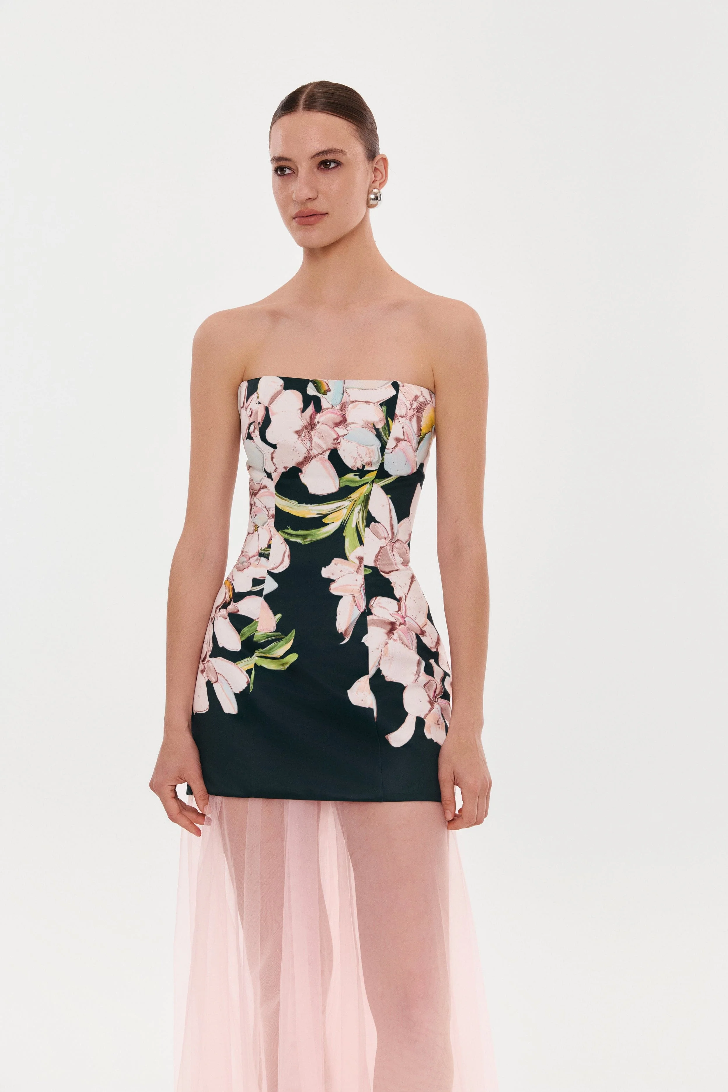 2-in-1 floral mini with a detachable candy pink sheer underskirt