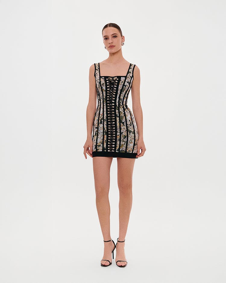Alluring floral mini dress with bold lace-up hook closure