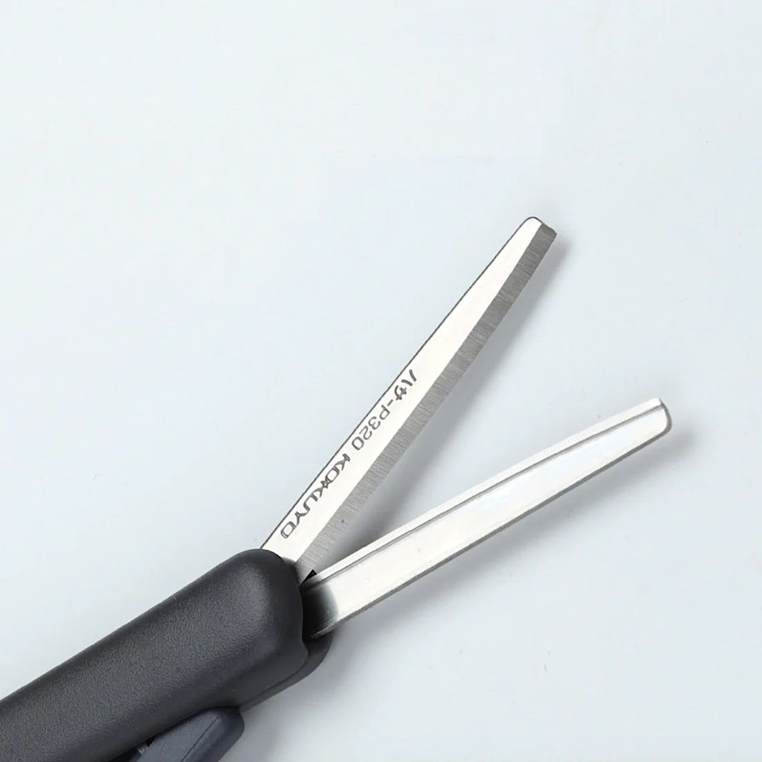 Compact Scissors with Slide Mechanism