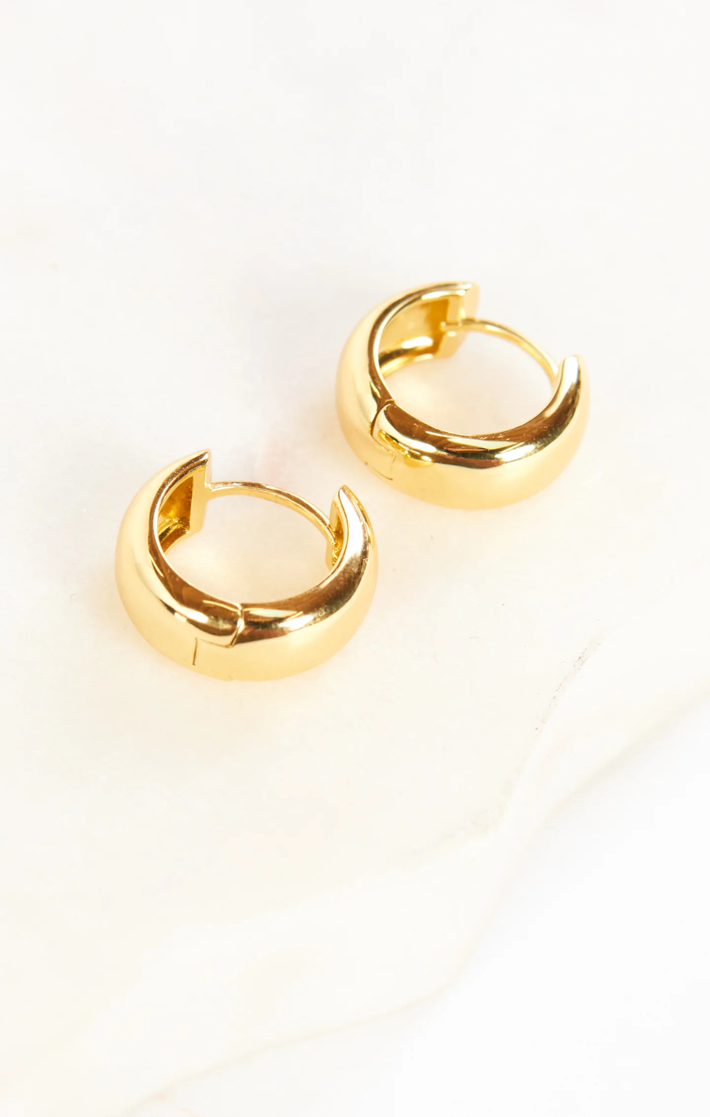 Luv AJ Monaco Huggie Earrings ~ Gold