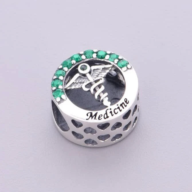 Medicine Symbol with Green Crystal Charm