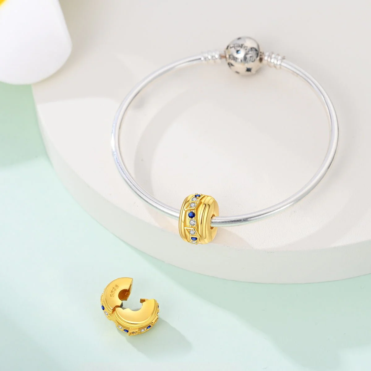 Golden Geometric with Blue and Clear Stones Clip Charm