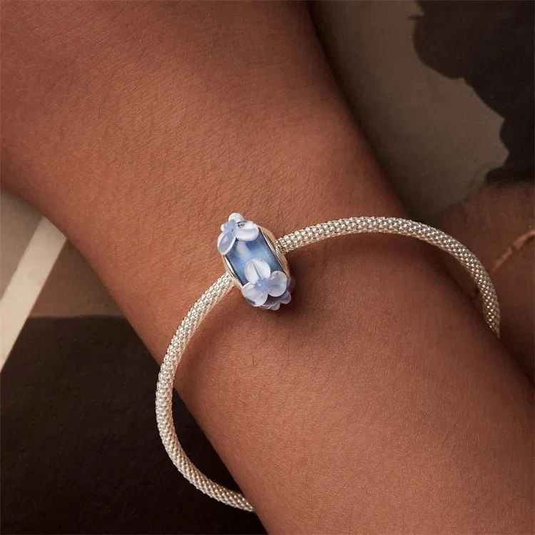 Blue Murano Glass with Raised Floral Accents Charm