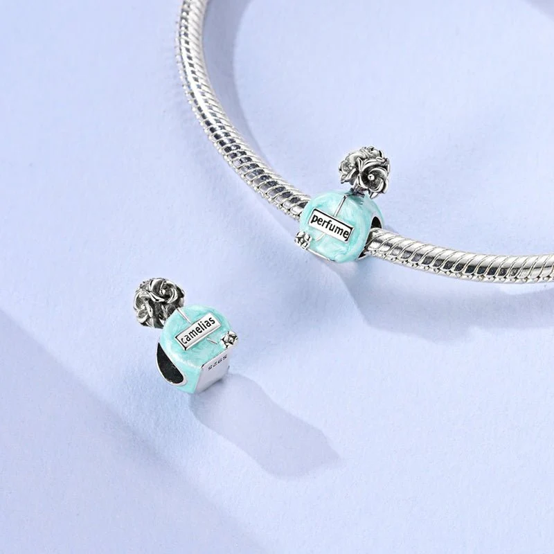 Elegant Blue Perfume Bottle Charm