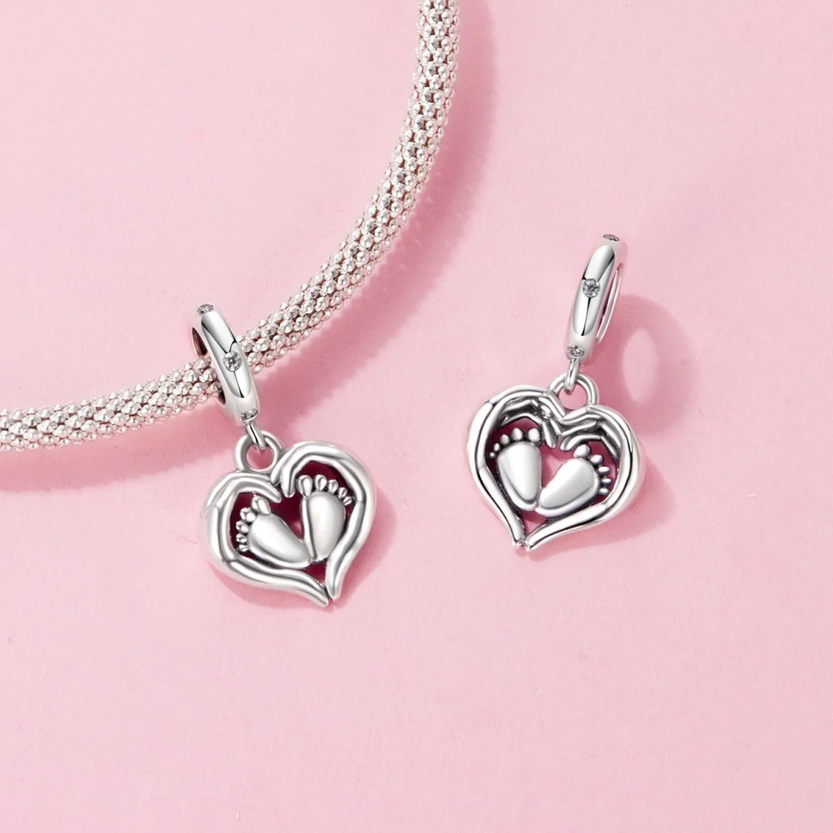 Baby Feet in Heart Hands Dangle Charm