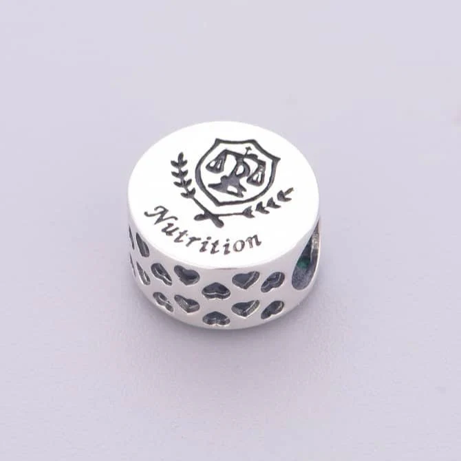 Nutrition Symbol with Green Crystals Charm