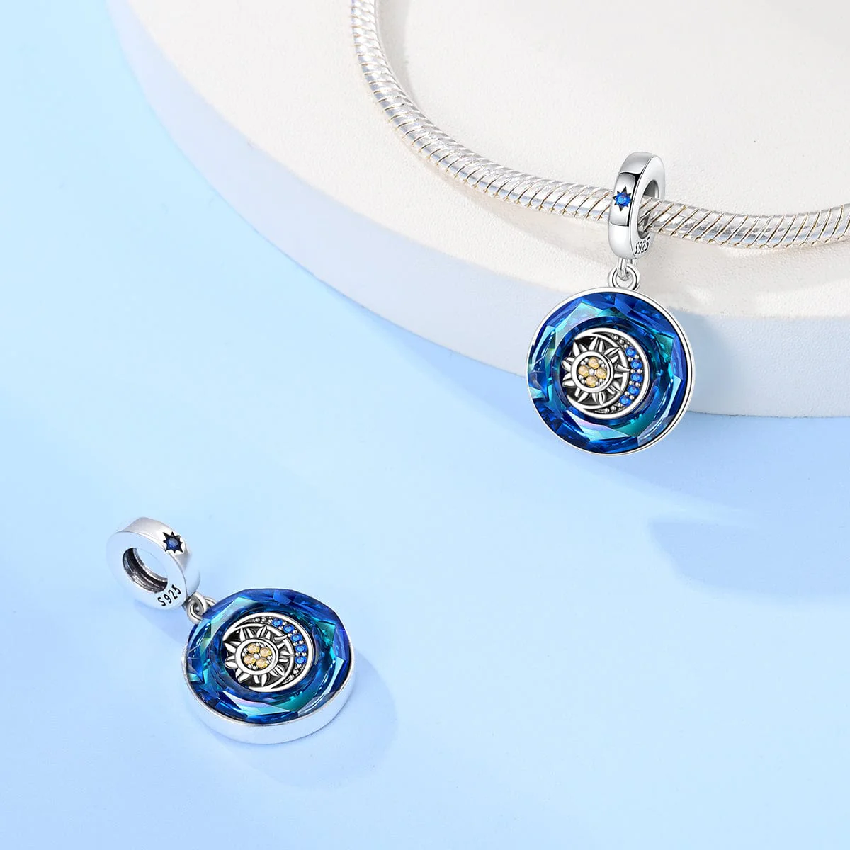 Sapphire Blue Crystal Charm with Sun & Moon Accent