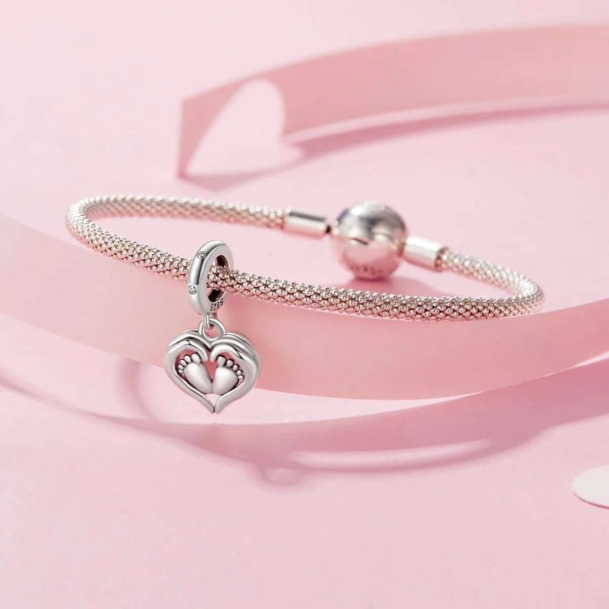 Baby Feet in Heart Hands Dangle Charm