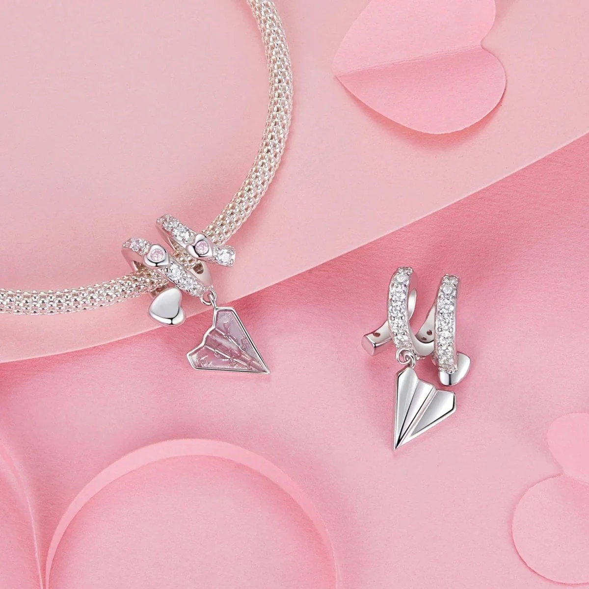 Crystal-Studded Heart Spiral with Pink Paper Plane Charm