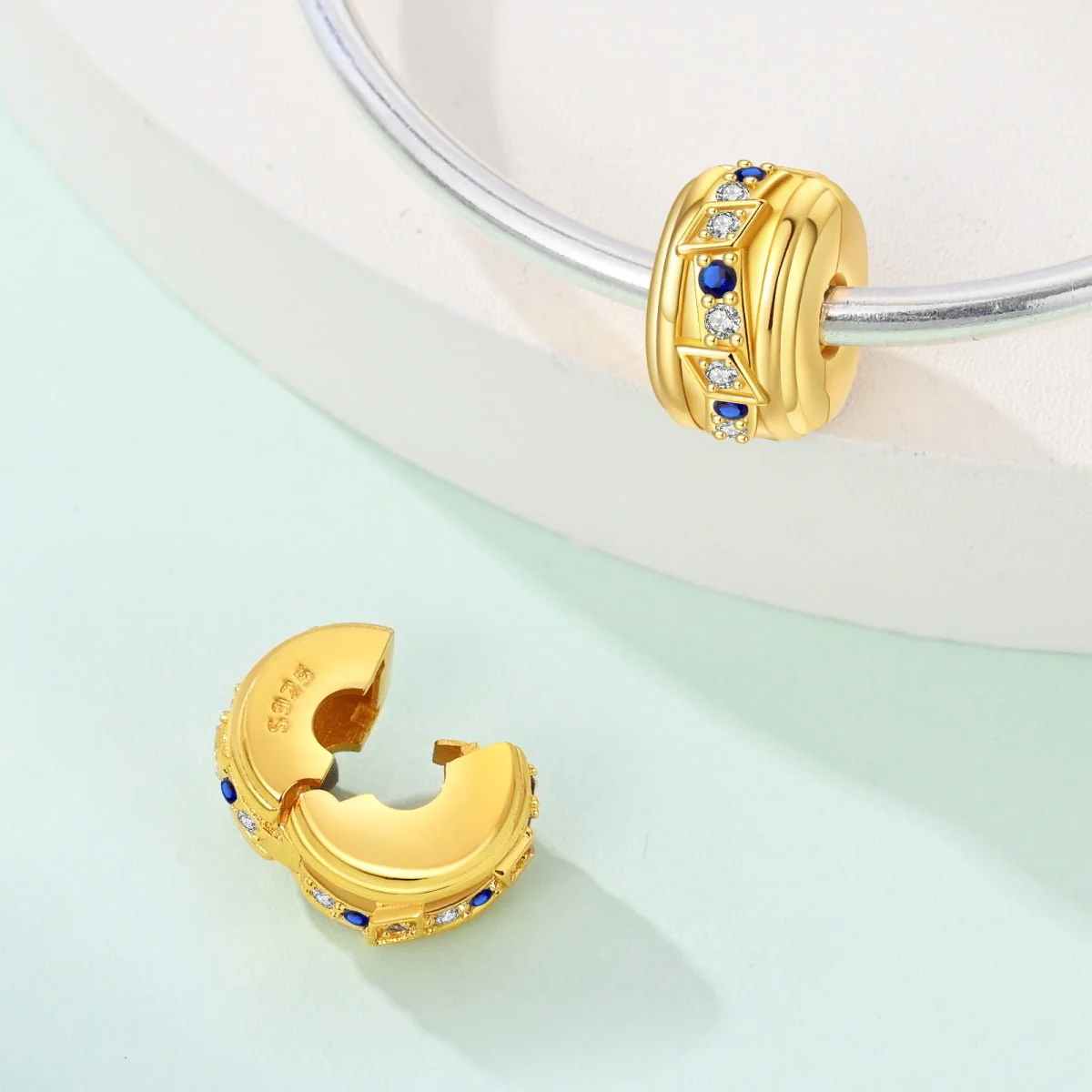 Golden Geometric with Blue and Clear Stones Clip Charm