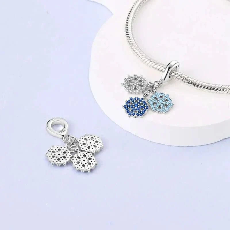Triple Snowflake Charm with Sparkling Blue and White Crystals