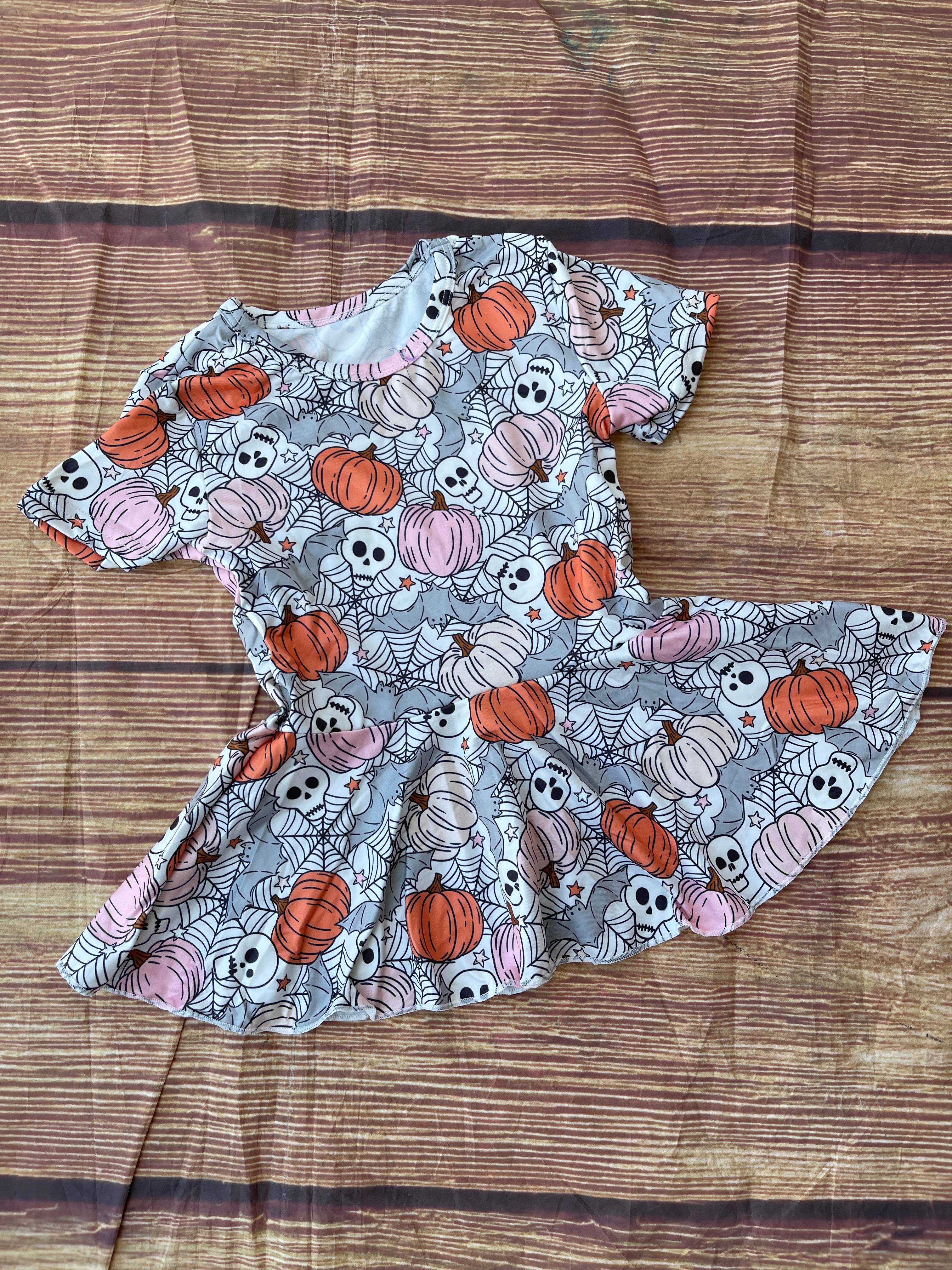 SKULL & PUMPKIN PEPLUM TOP