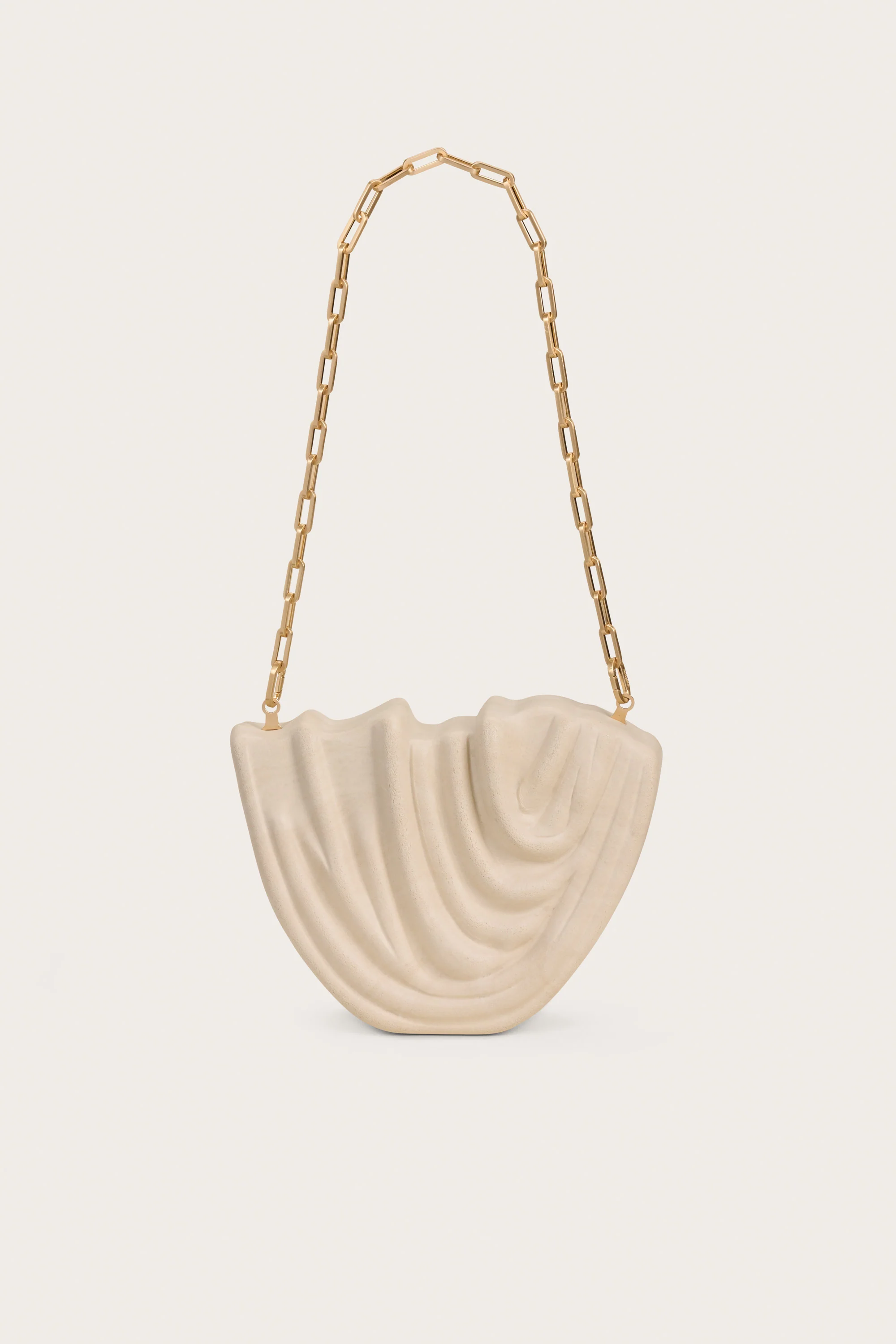 VENUS CLUTCH - TRAVERTINE
