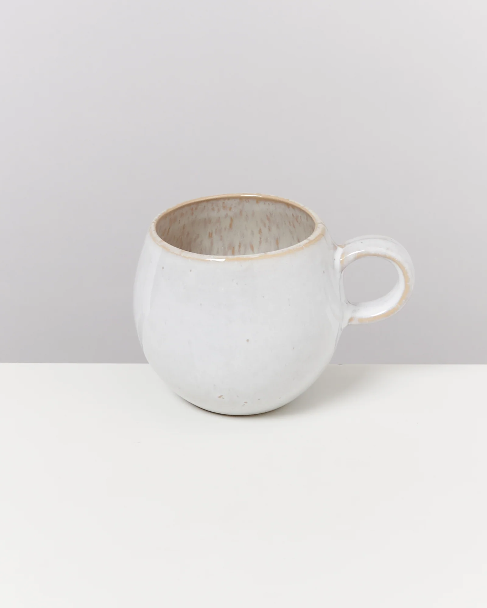 Areia Tasse klein sand