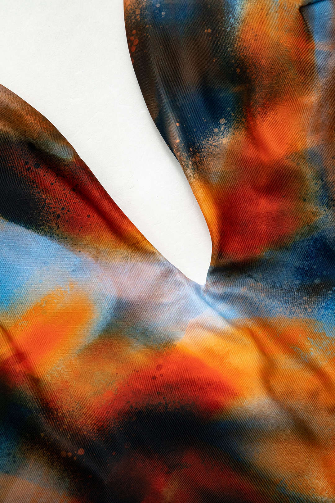 Abstract Print V-neck Cross-back Tie Swimsuit and Mesh Mini Sarong Skirt Set