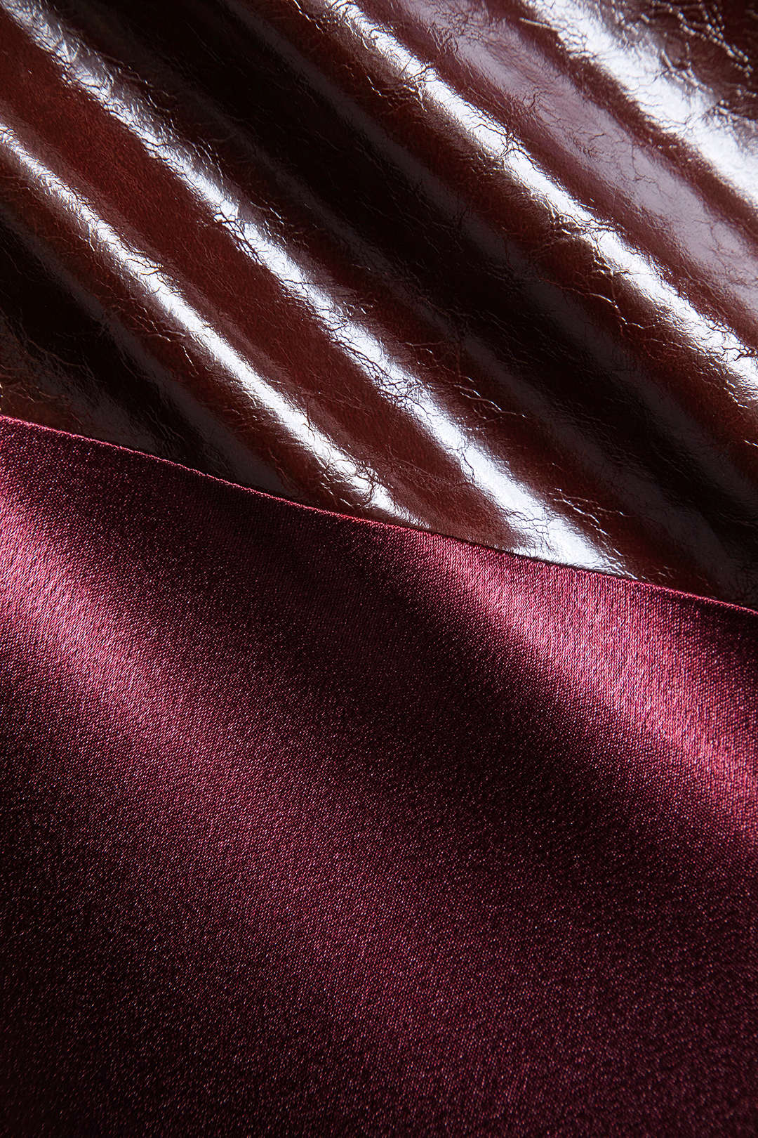 Satin Patchwork Faux Leather Asymmetric Skirt