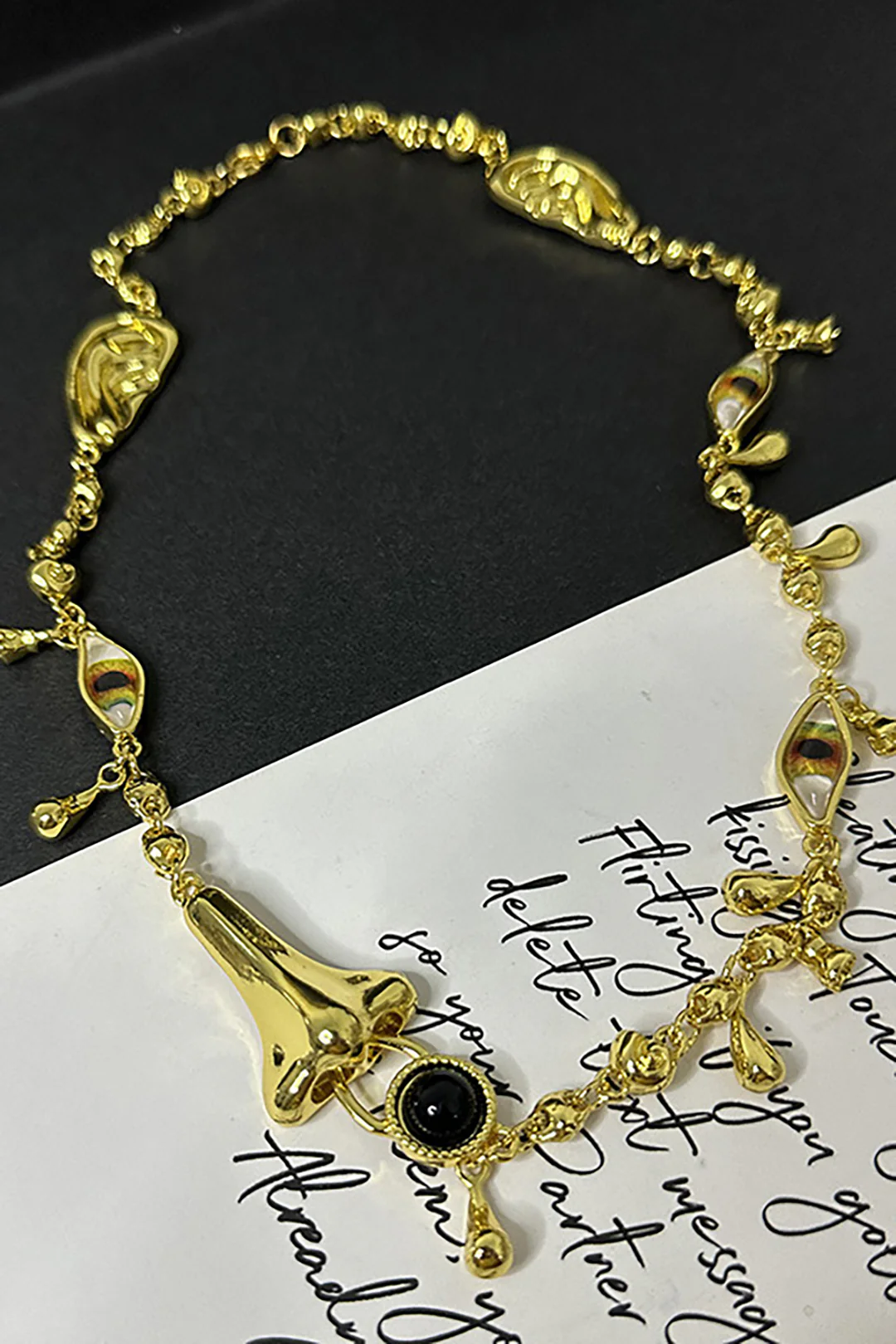 Ear, Eye, and Nose Design Necklace