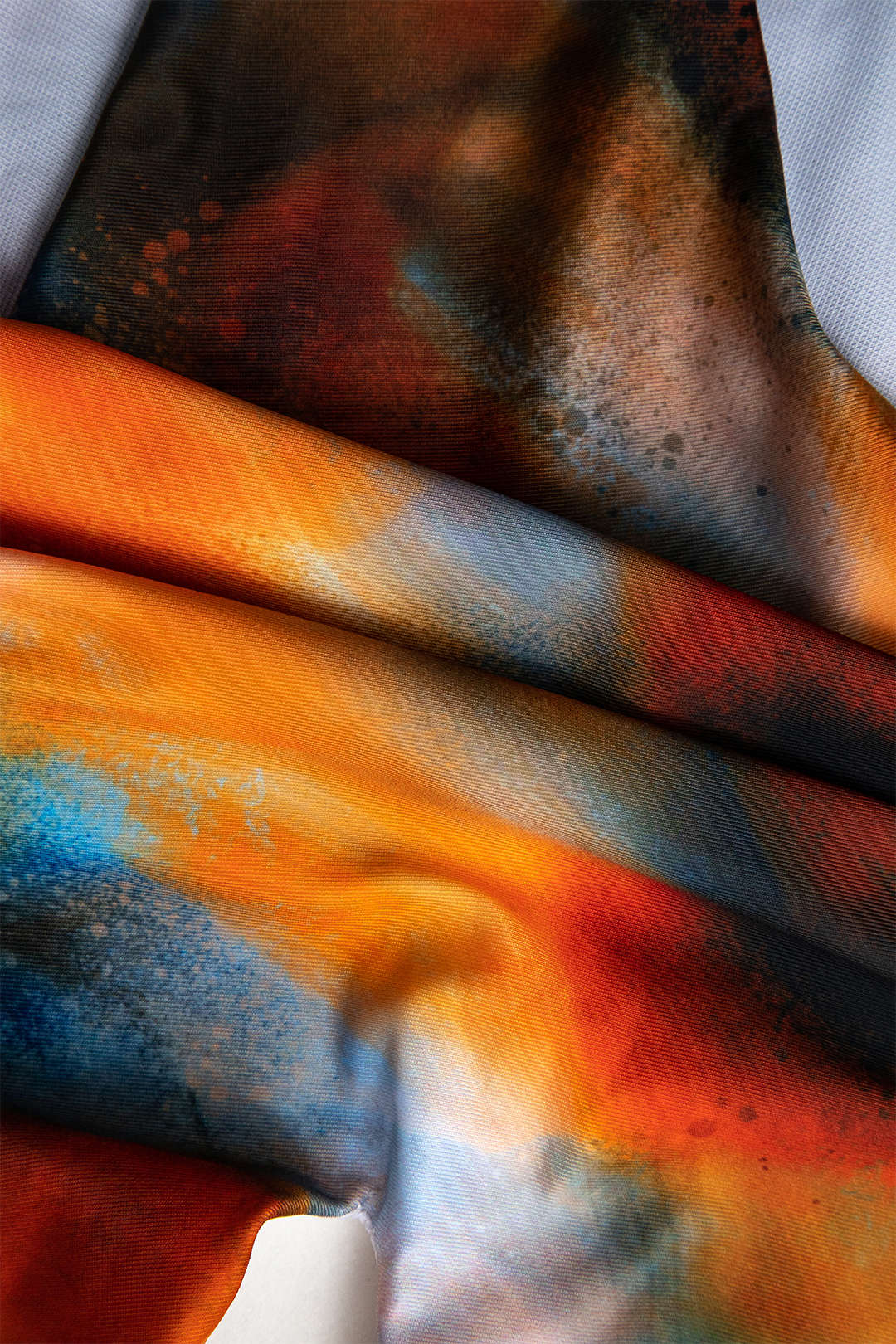 Abstract Print V-neck Cross-back Tie Swimsuit and Mesh Mini Sarong Skirt Set