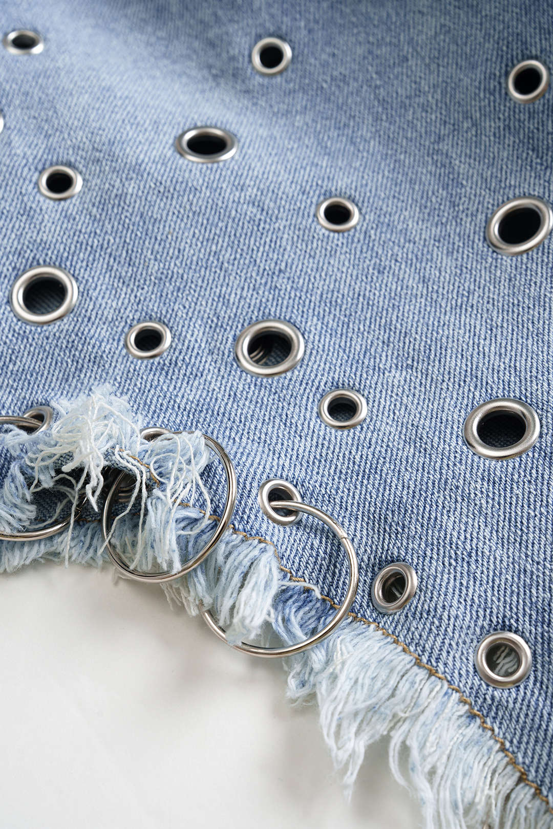 Metallic Ring Cut Out Denim Skirt