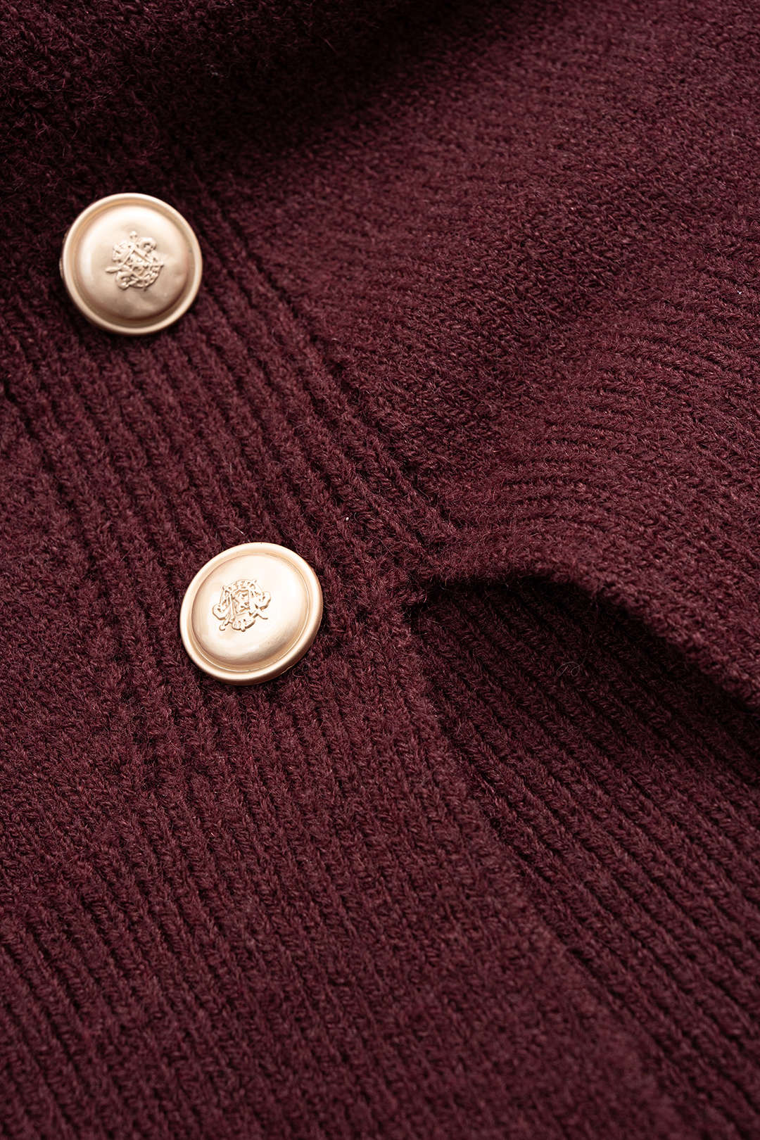 Asymmetrical Metallic Button Long Sleeve Knit Top