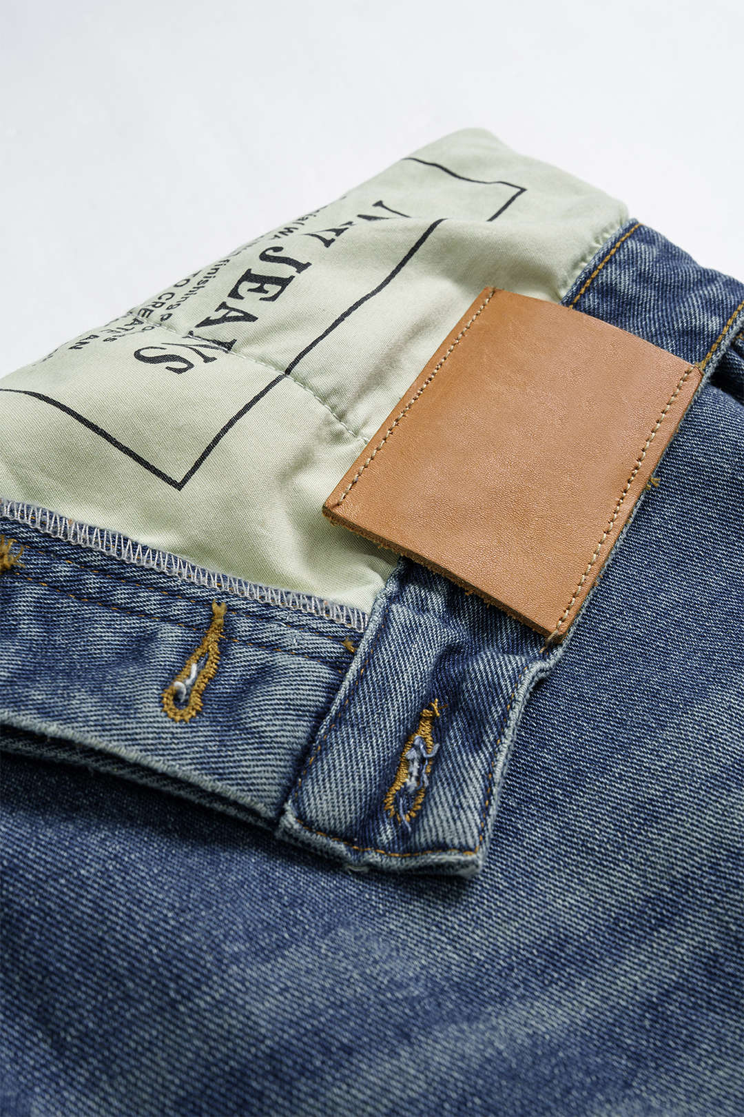 Plus Size Denim Asymmetrical High Waist Jeans