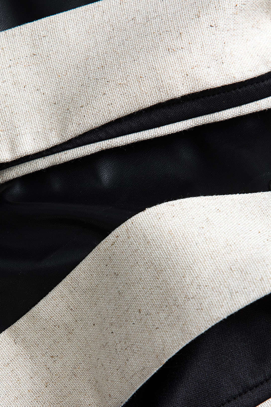 Faux Leather Asymmetric Patchwork Trousers