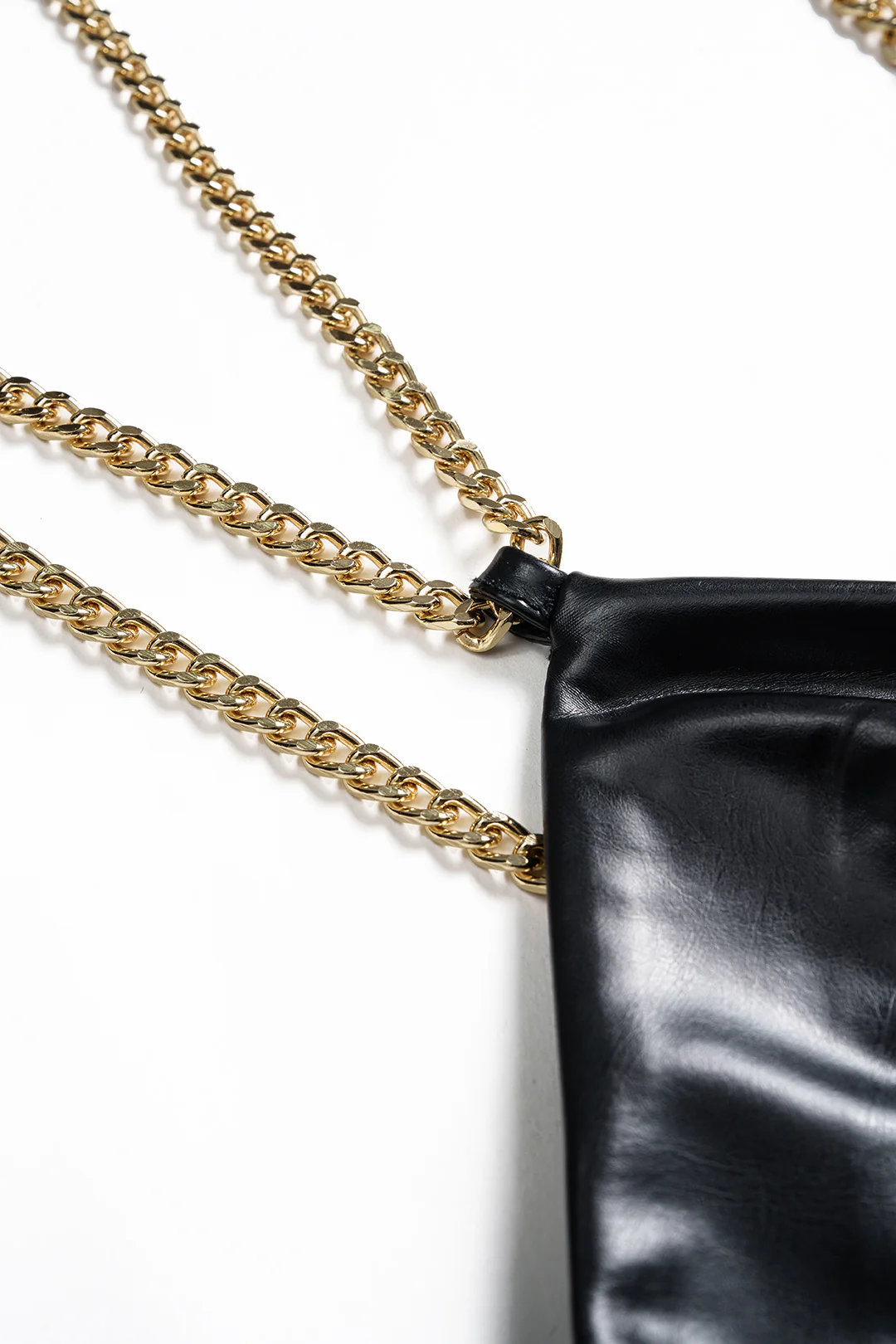 Faux Leather Chain Patchwork Sleeveless V-Neck Bodysuit