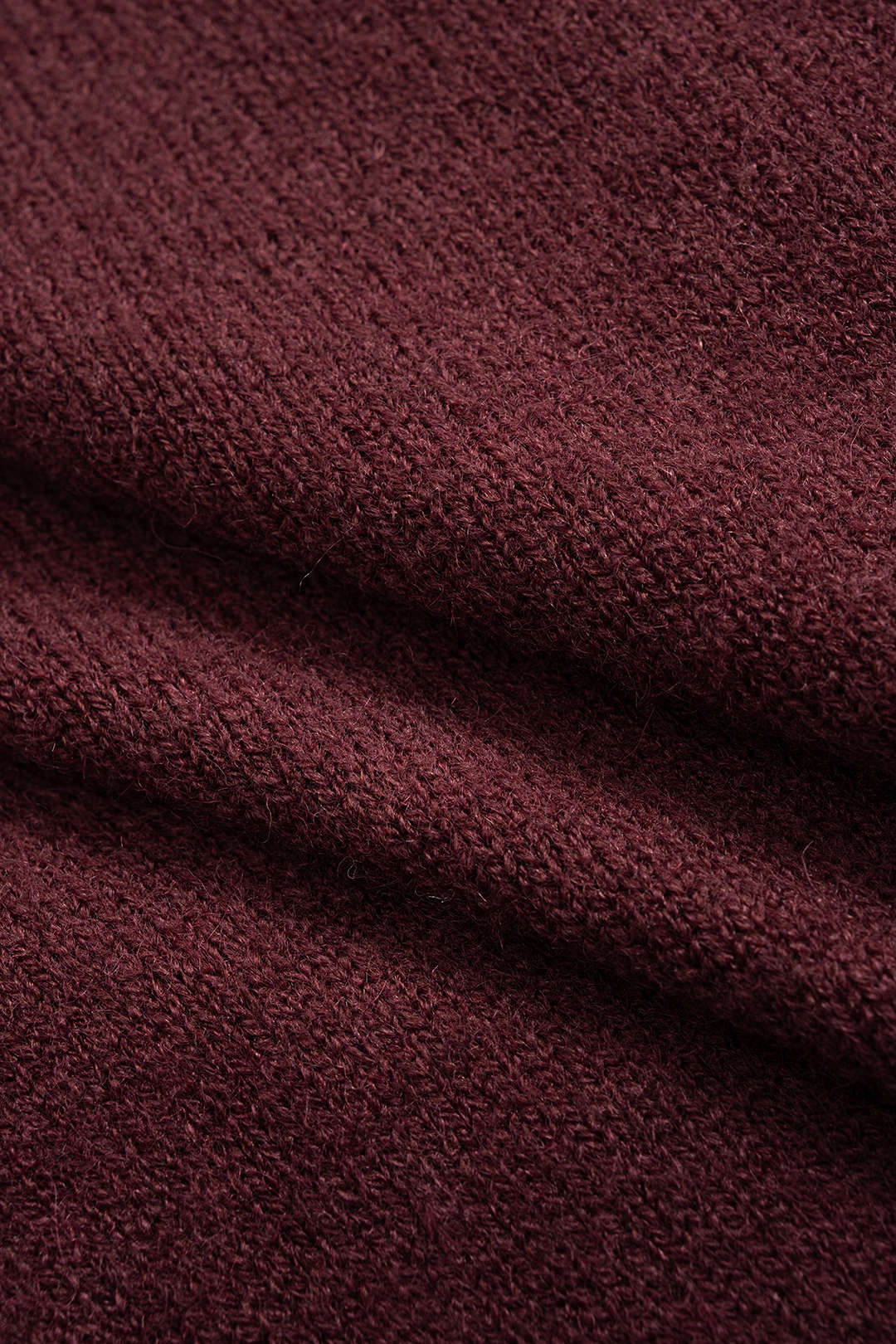 Asymmetrical Metallic Button Long Sleeve Knit Top