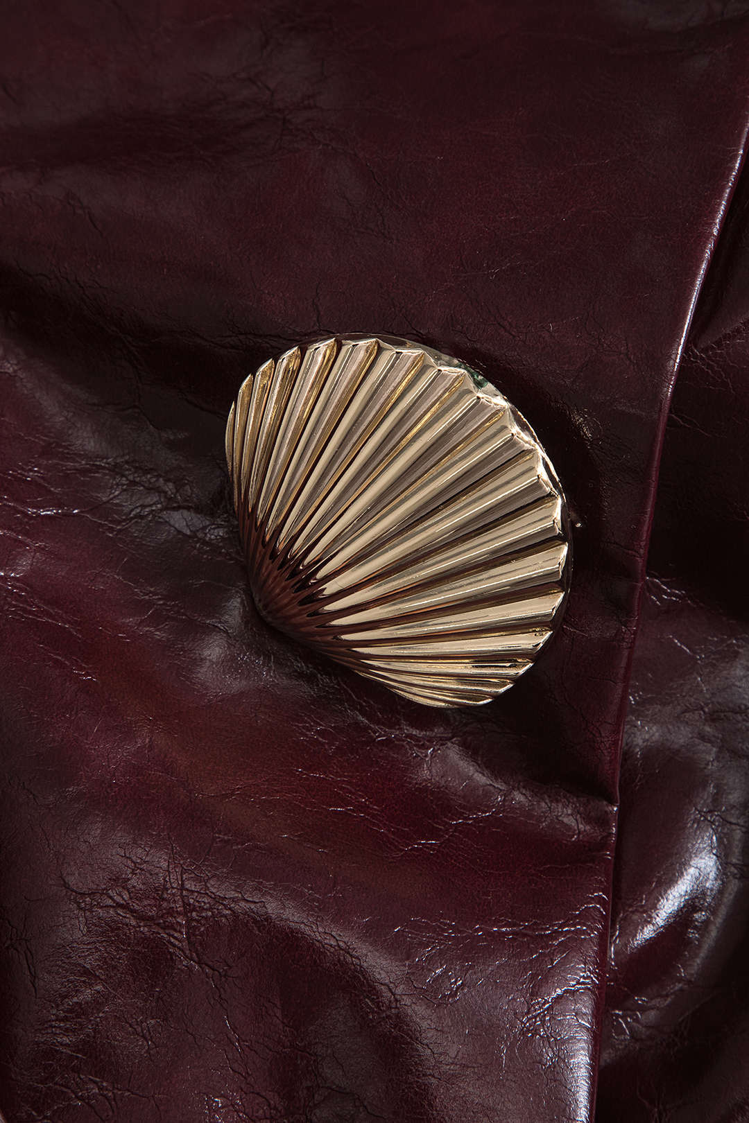 Faux Leather Strapless Mini Dress with Decorative Shells