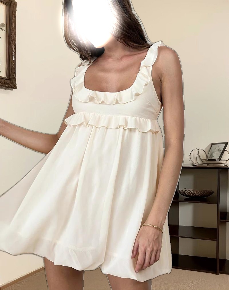 Garistha Babydoll Puffball Mini Dress in Cream