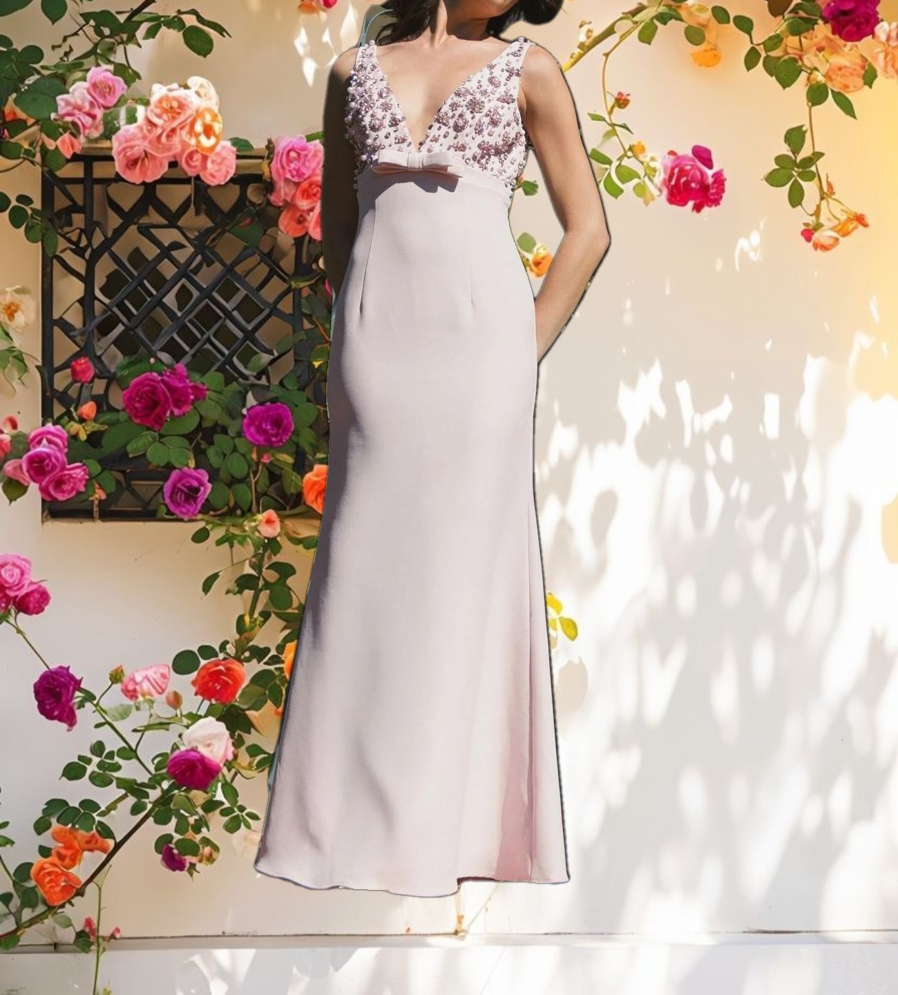 Pink Crepe Sleeveless Beaded V Neck Gown With Bow
