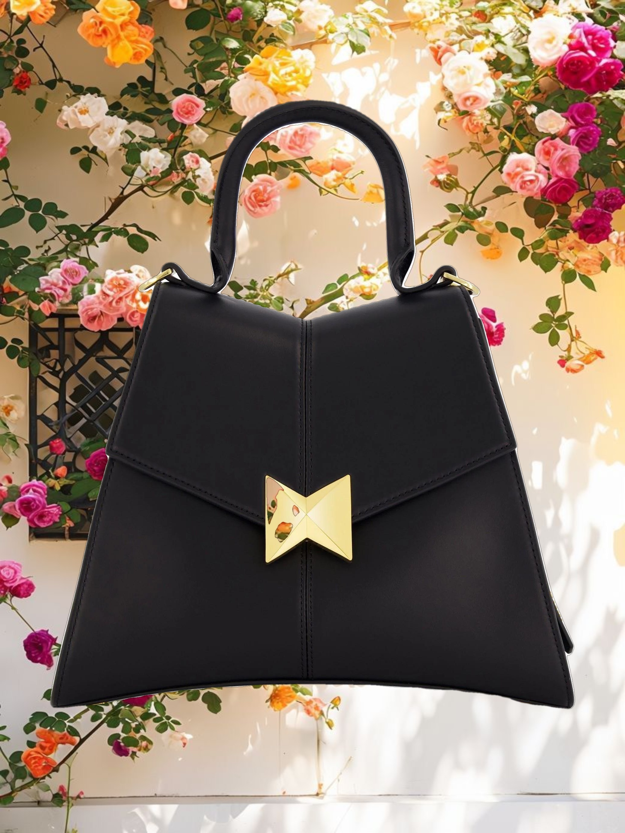 Medium Angular Black Leather Handbag With Gold Hardware