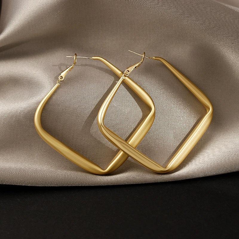 Diamond earrings in large metal blocks 759194871661