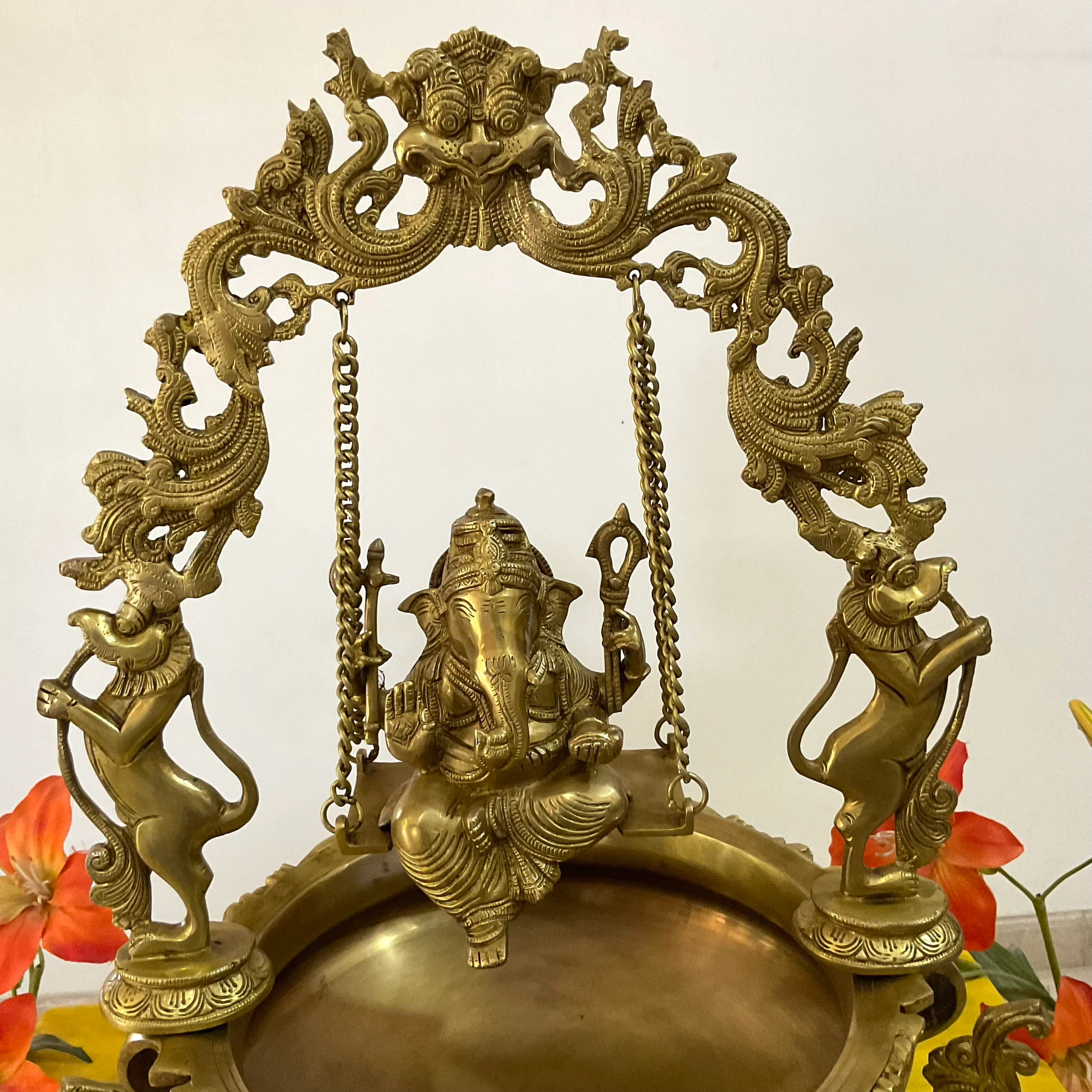 Ganesha Swing Decorative Brass Urli - Festive Indian Decor