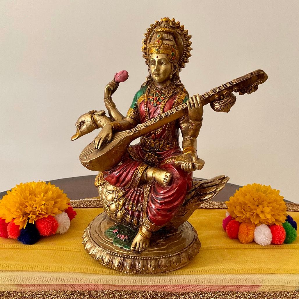 Goddess Saraswati Copper Finish Marble Dust and Resin Idol - Decorative Figurine