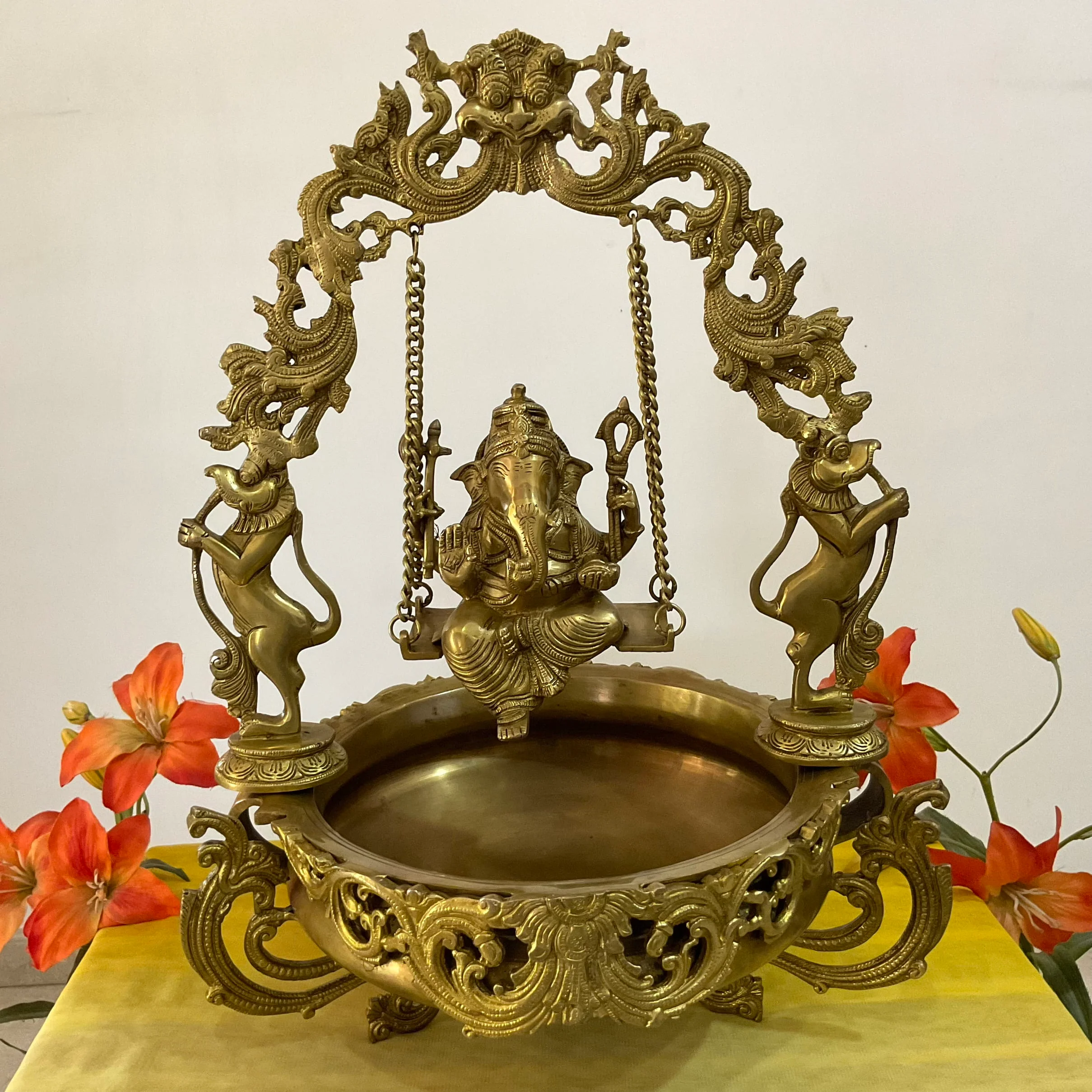 Ganesha Swing Decorative Brass Urli - Festive Indian Decor