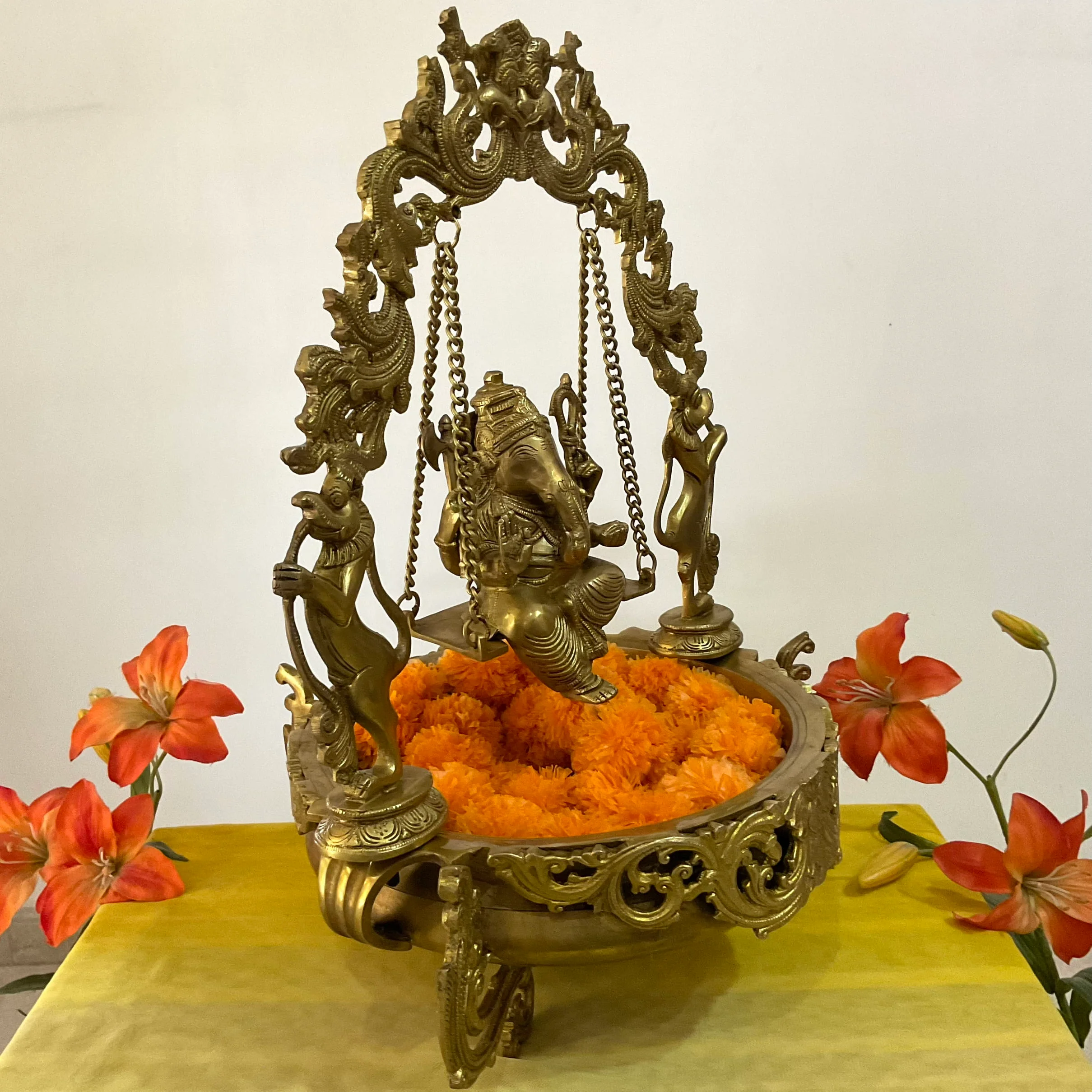Ganesha Swing Decorative Brass Urli - Festive Indian Decor