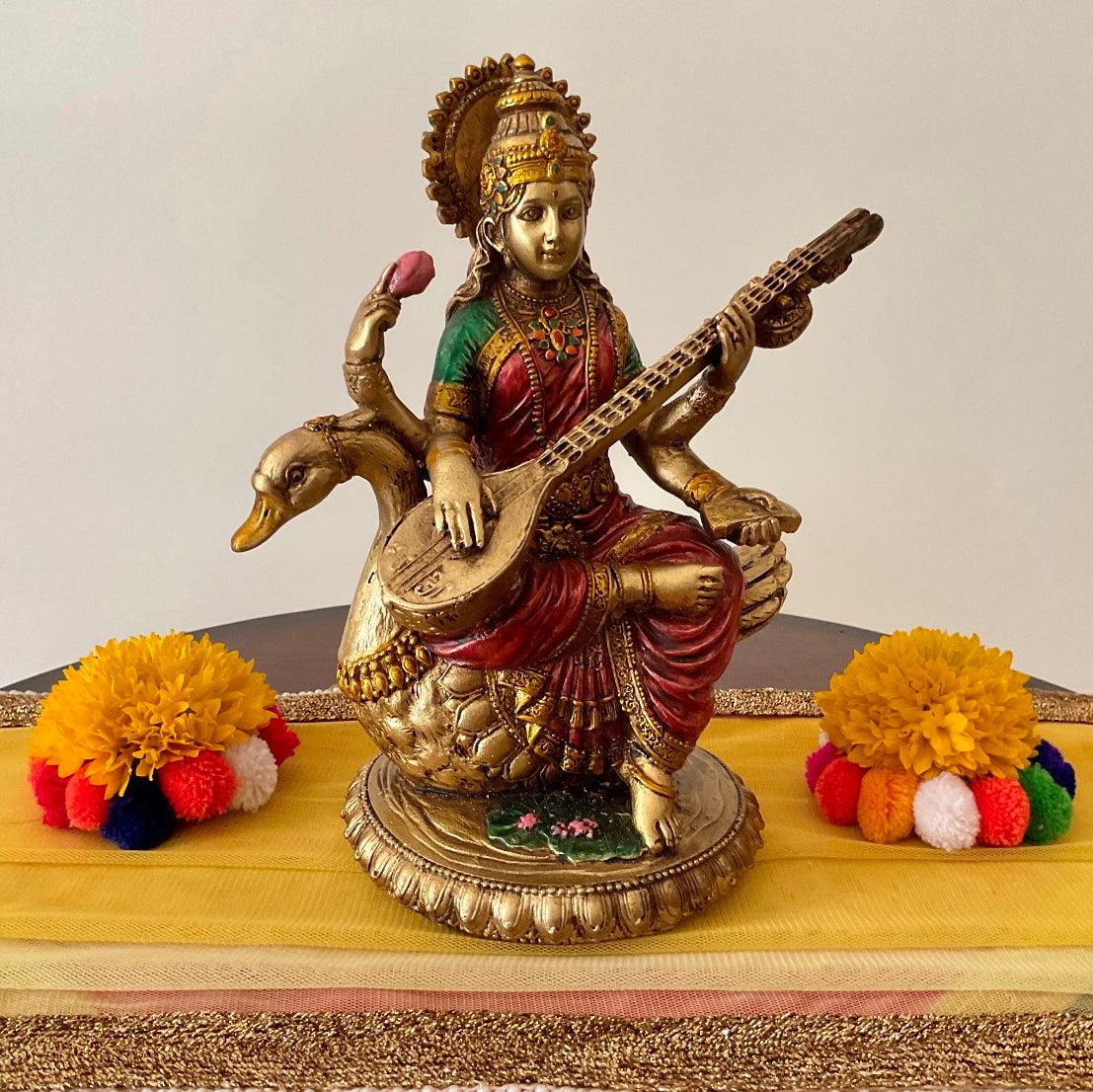 Goddess Saraswati Copper Finish Marble Dust and Resin Idol - Decorative Figurine