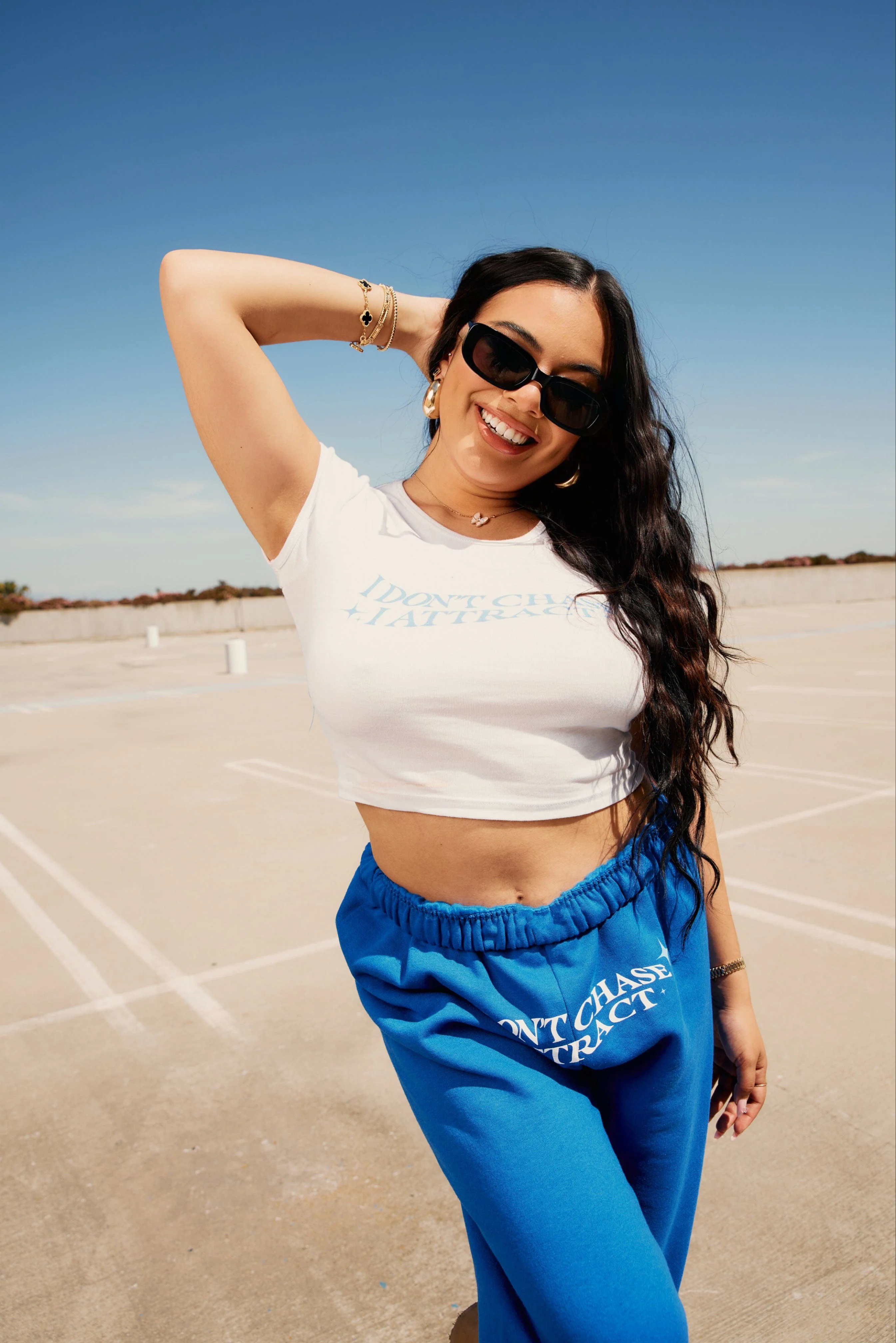 Adelaine Morin: Manifestation White Baby Tee