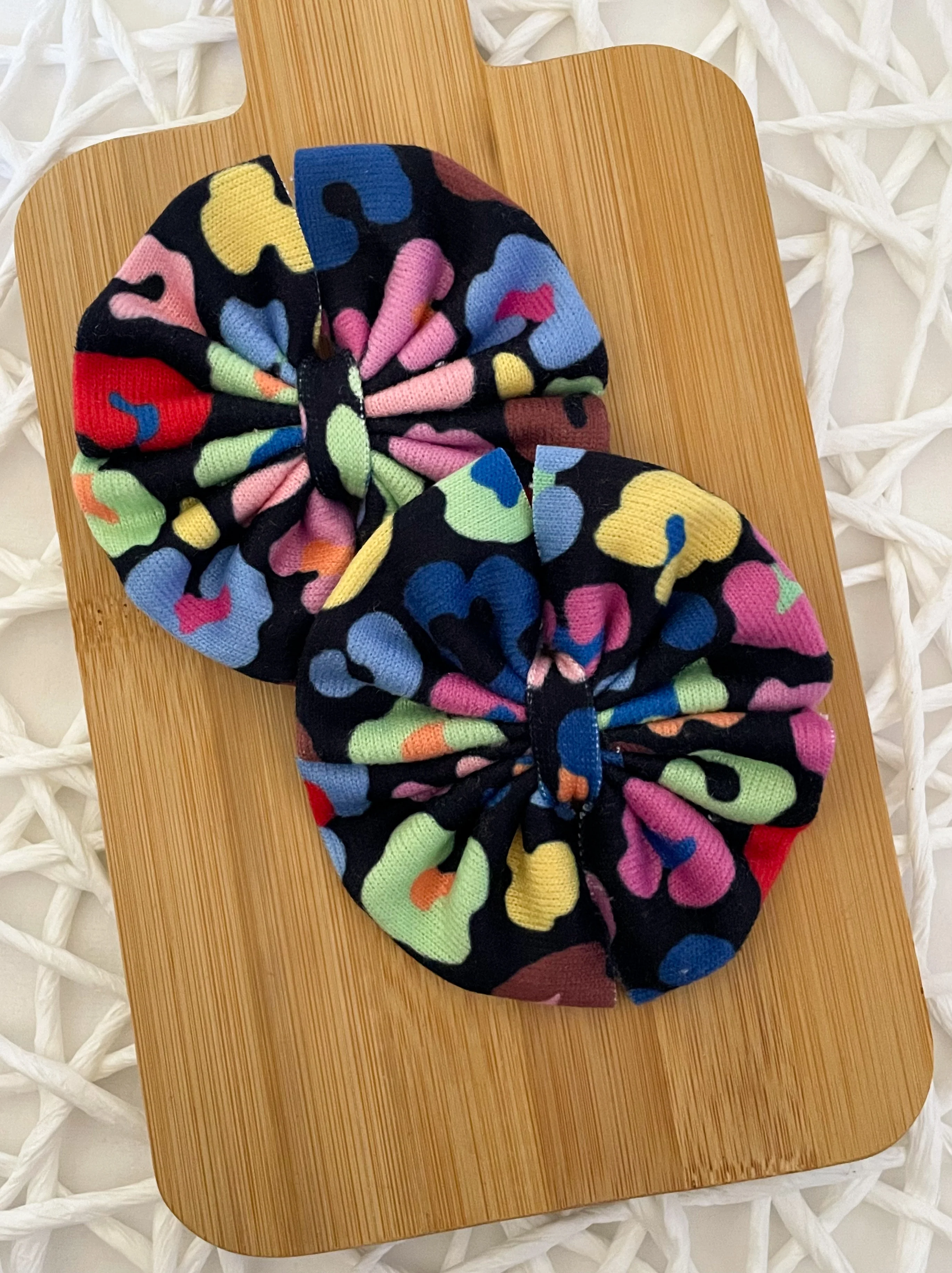 Rainbow Leopard on Black Fabric Bows