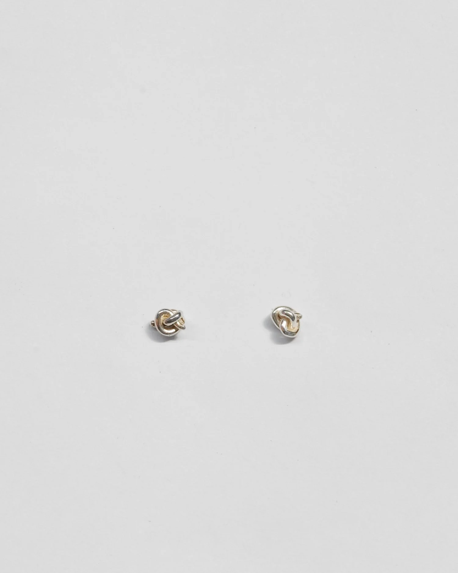 Tiny Knot Studs in Sterling Silver