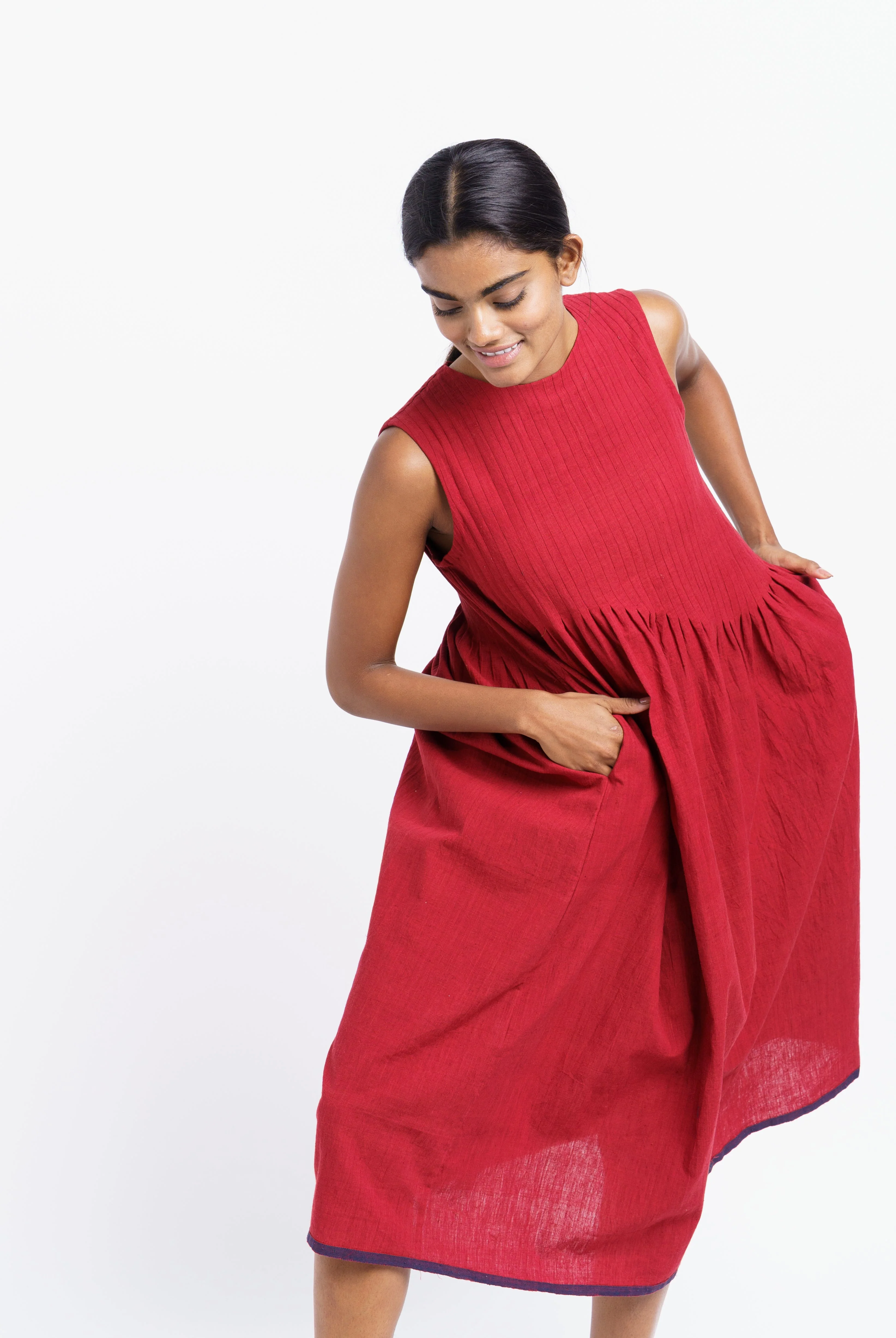Red pleated midi dress