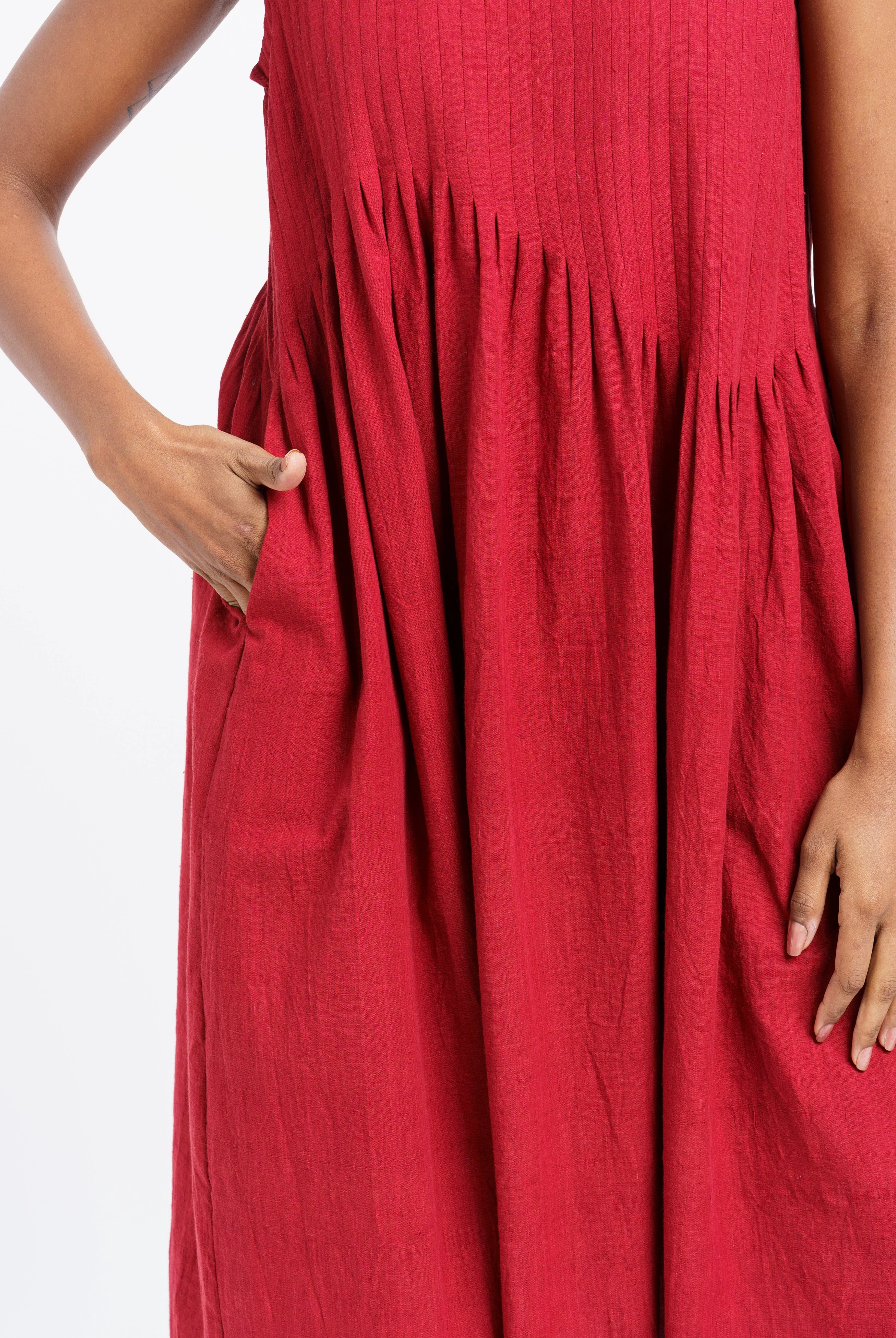 Red pleated midi dress