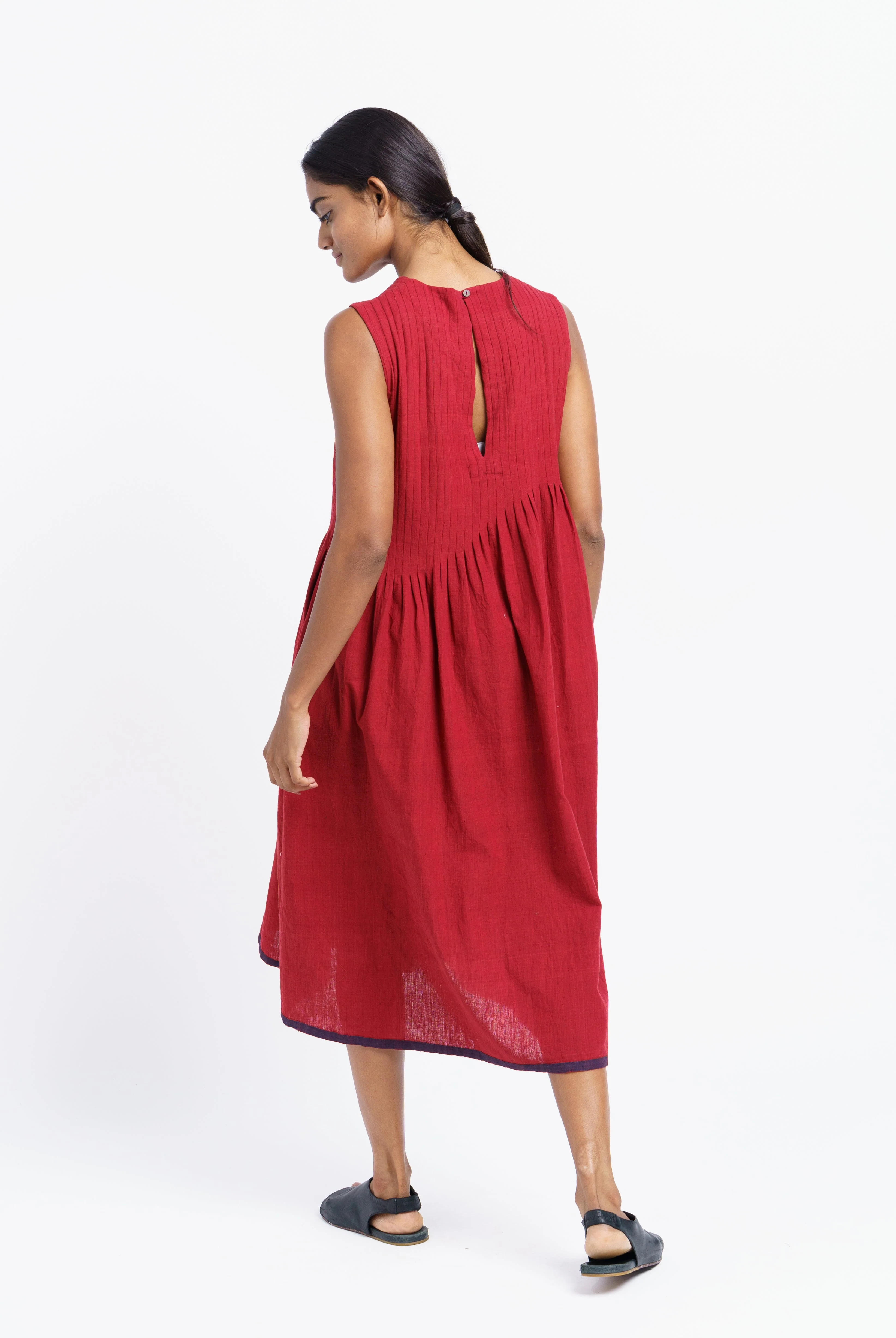 Red pleated midi dress