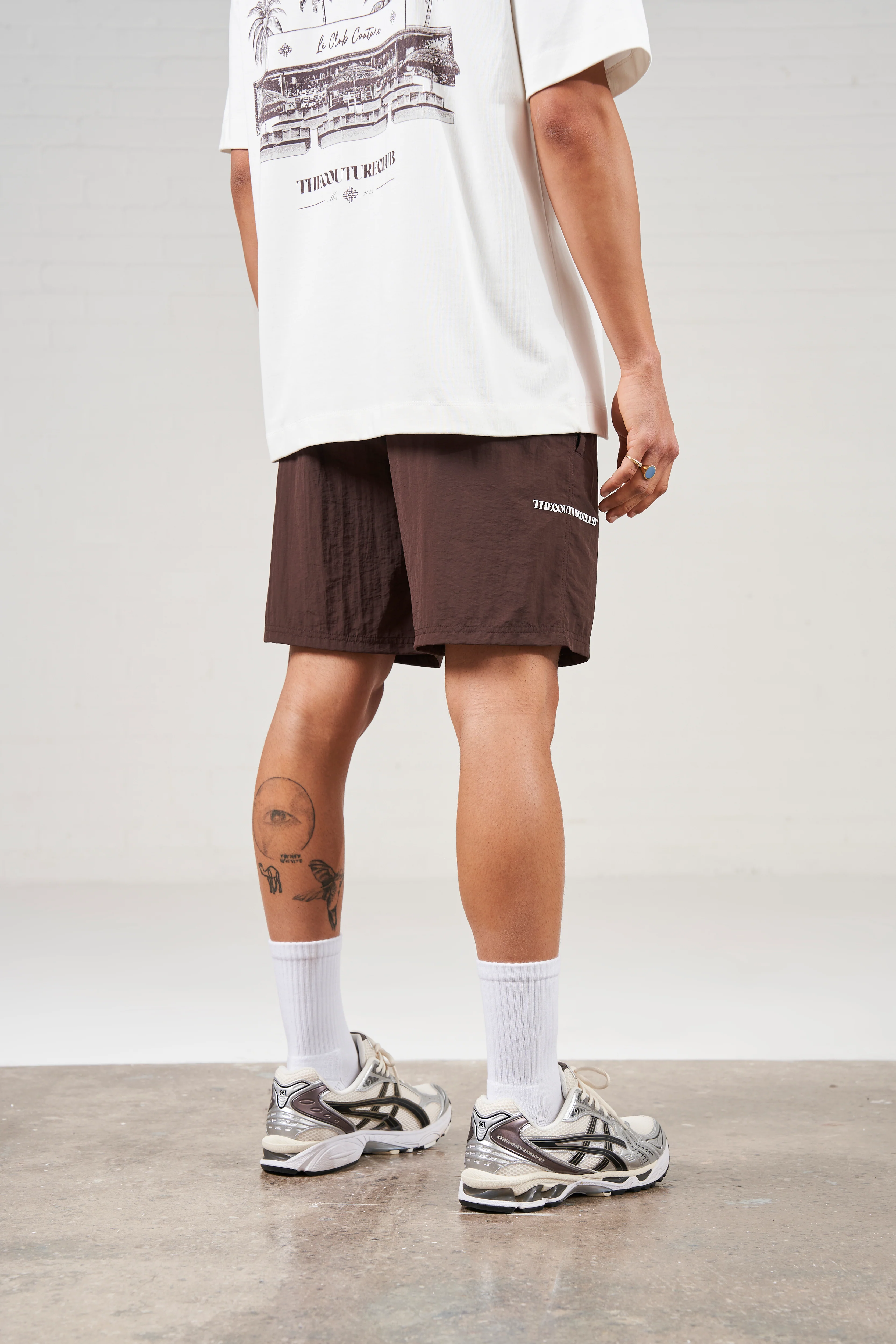 COPYRIGHT EMBLEM MID LENGTH SWIM SHORTS - BROWN