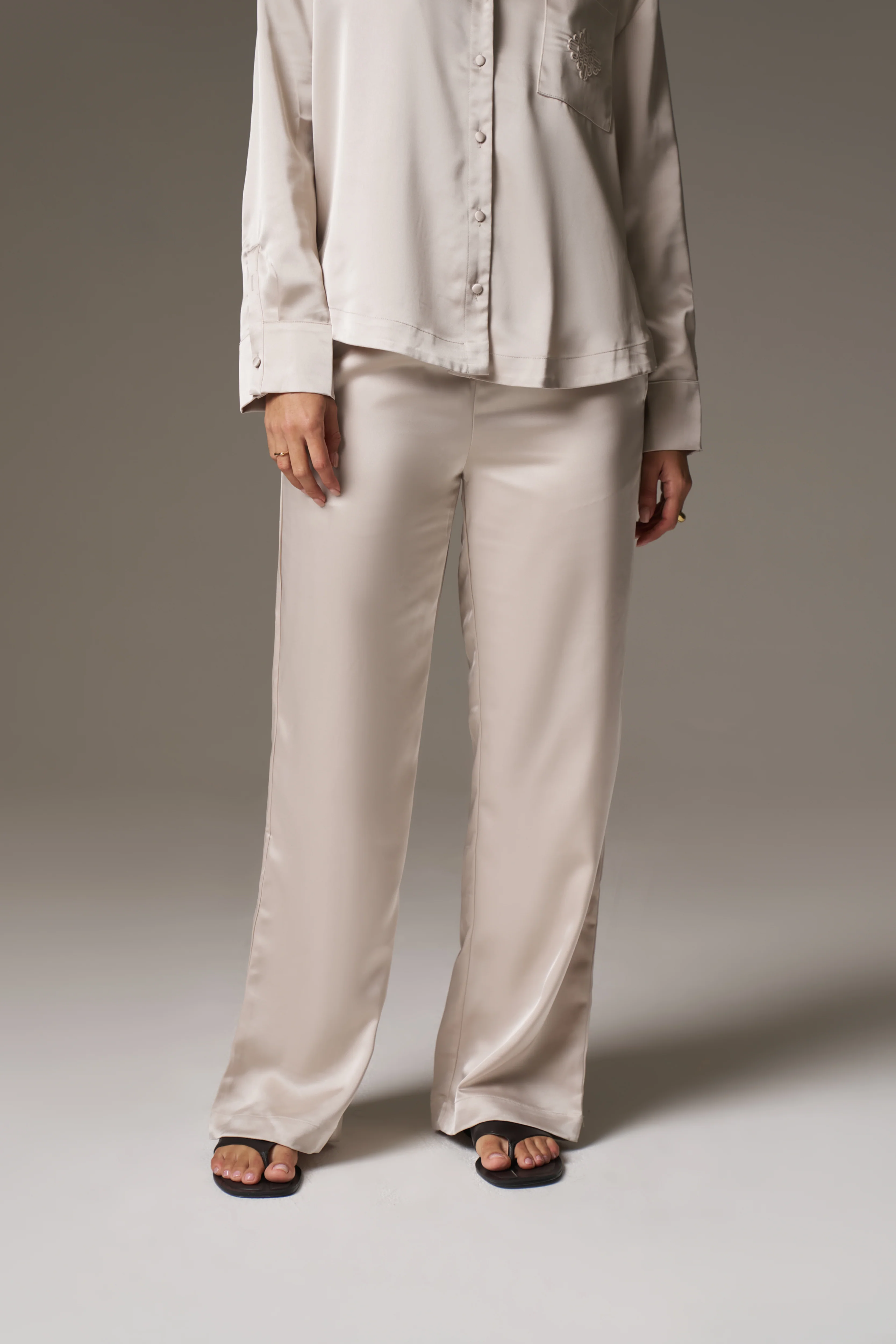 SATIN EMBLEM TROUSERS - BEIGE