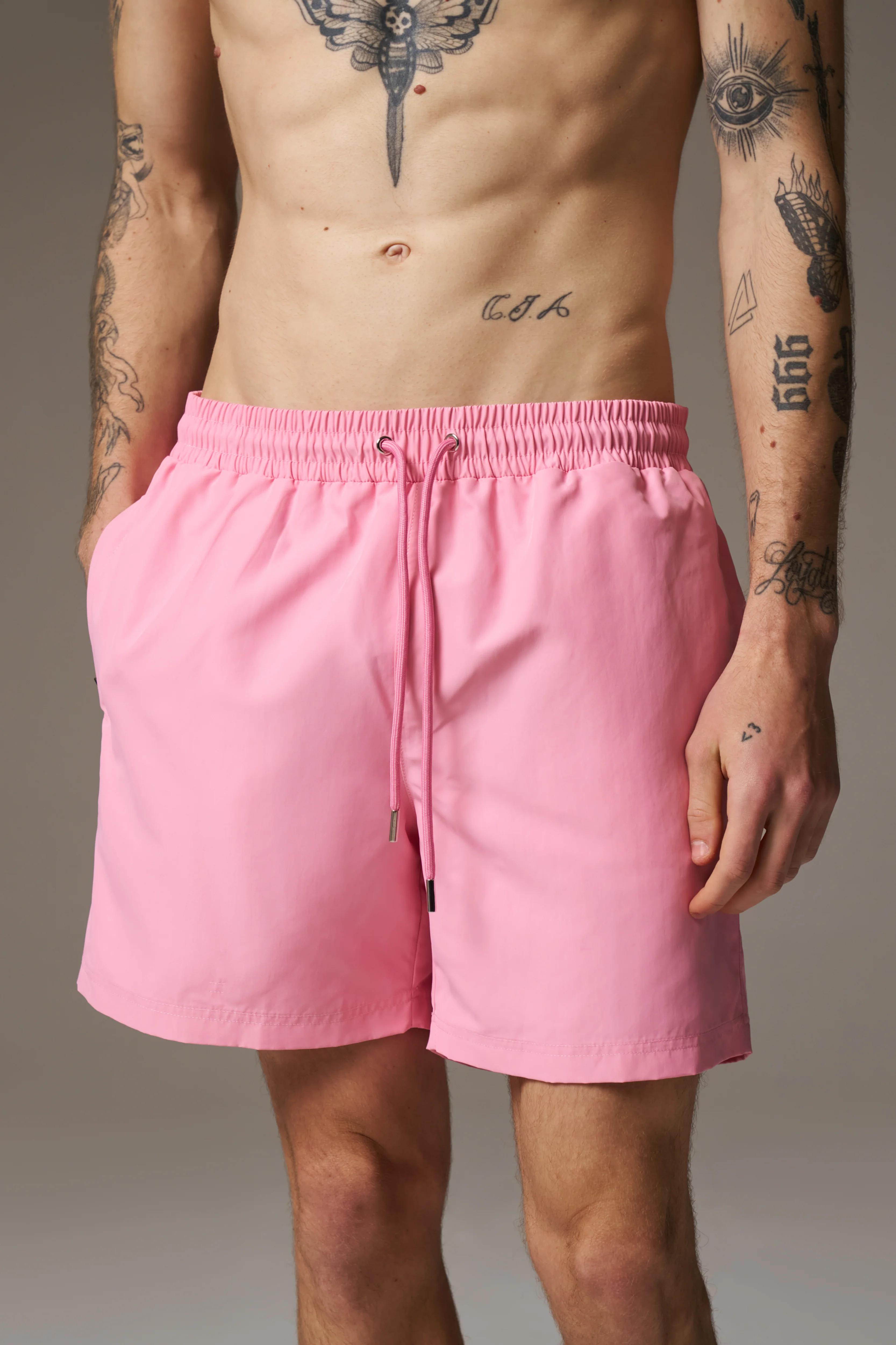WATER REACTIVE EMBLEM SWIM SHORT - PINK