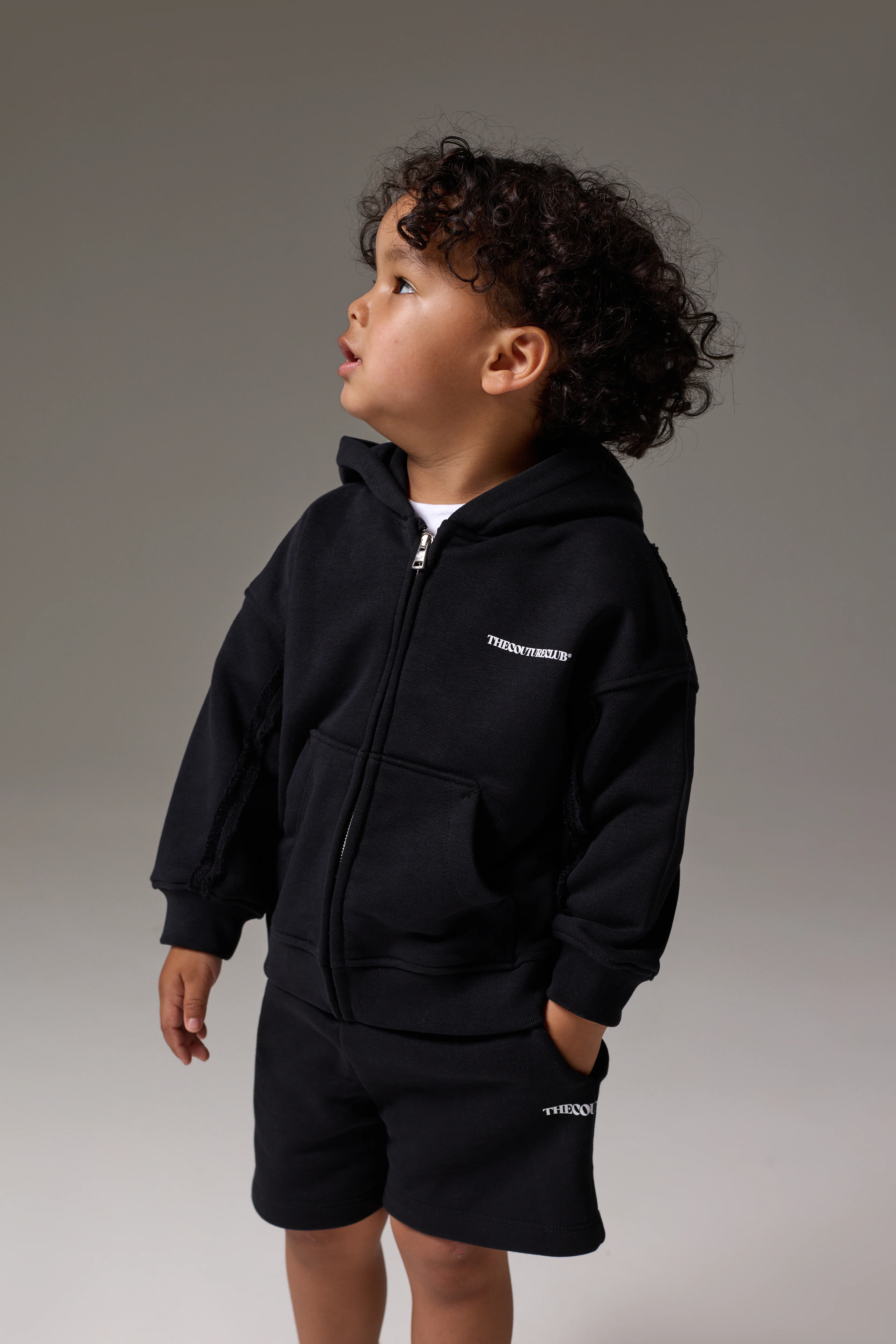 KIDS COPYRIGHT ZIP THROUGH HOODIE - BLACK