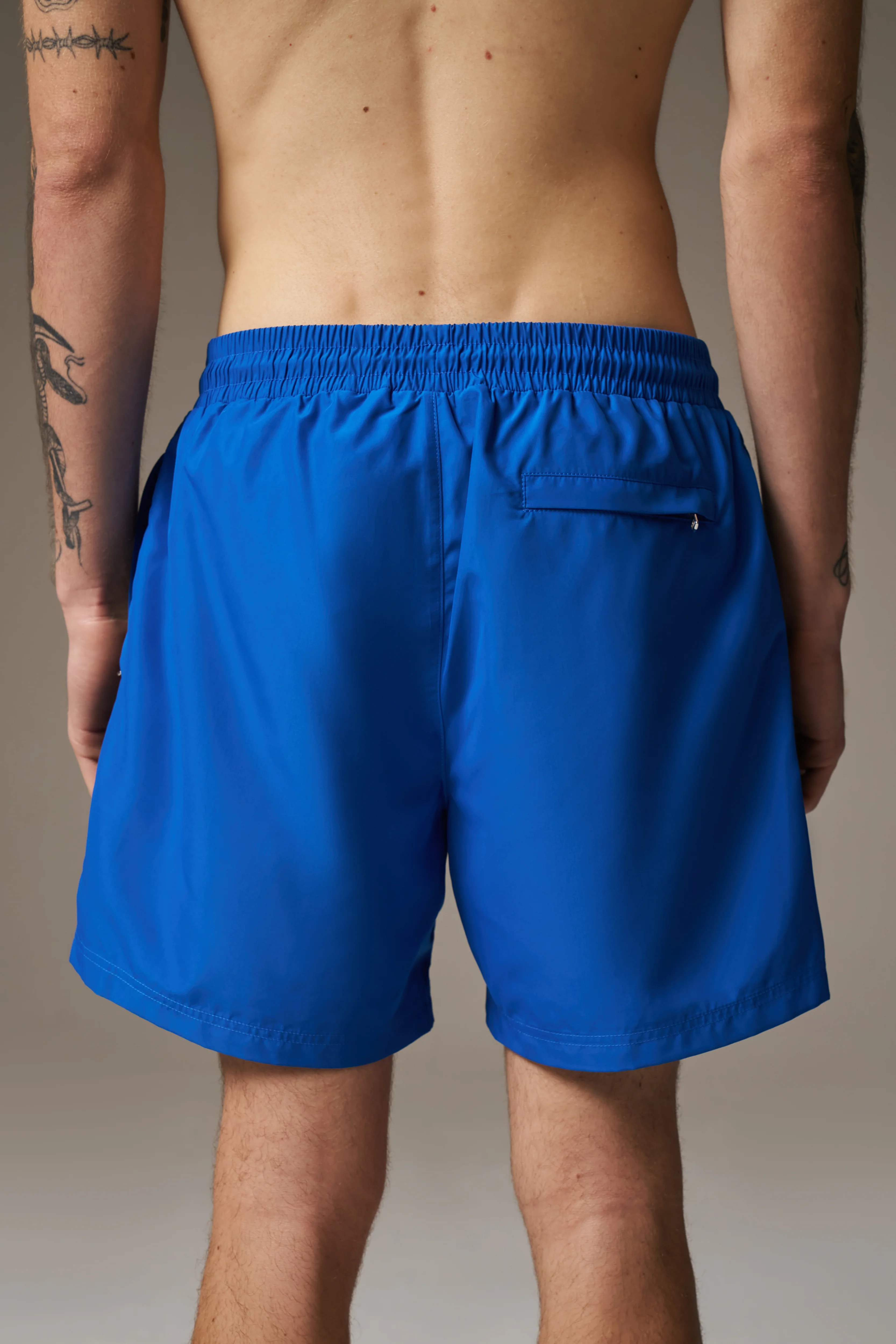 WATER REACTIVE EMBLEM SWIM SHORT - COBALT